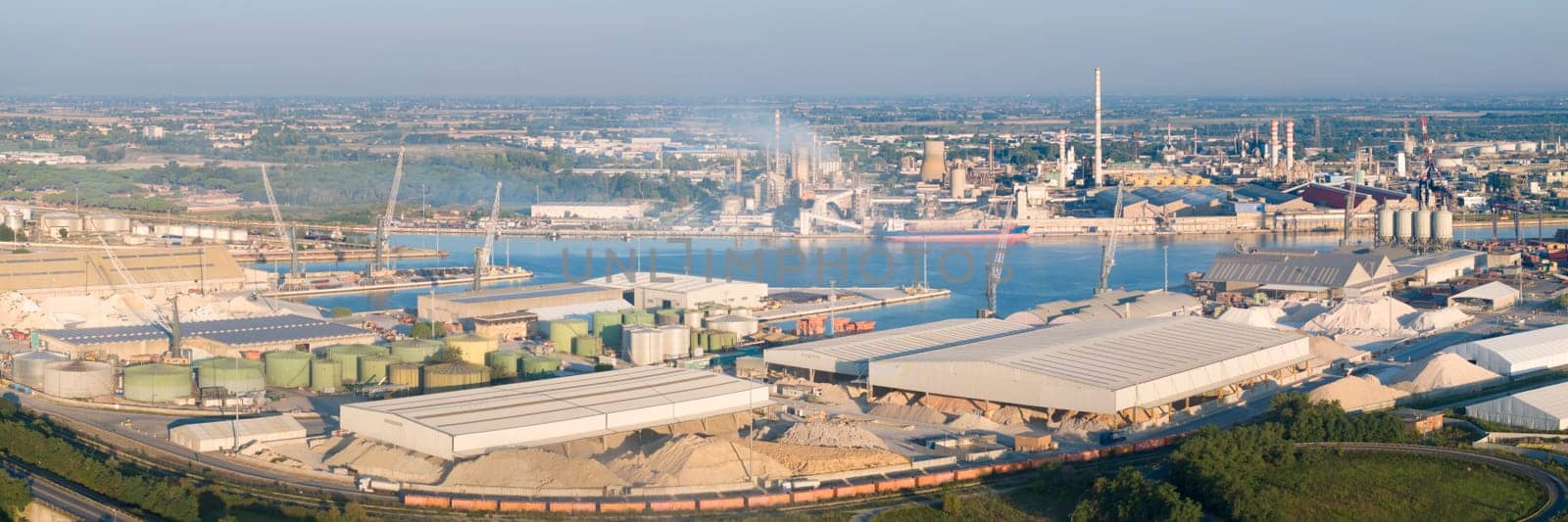 Aerial shot of industrial and port area of Ravenna,production district is made up of a chemical and petrochemical pole, thermoelectric and metallurgical plants.