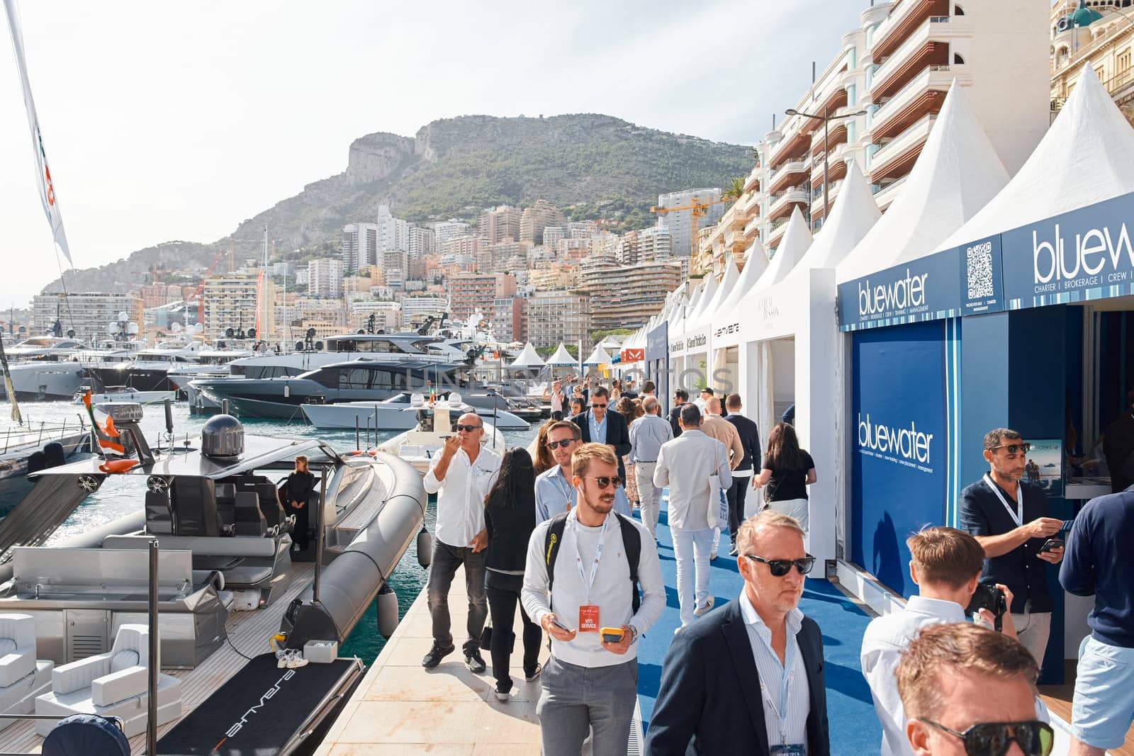 Monaco, Monte Carlo, 29 September 2022 - a lot of people, clients and yacht brokers look at the mega yachts presented, discuss the novelties of the boating industry at the famous motorboat exhibition by vladimirdrozdin