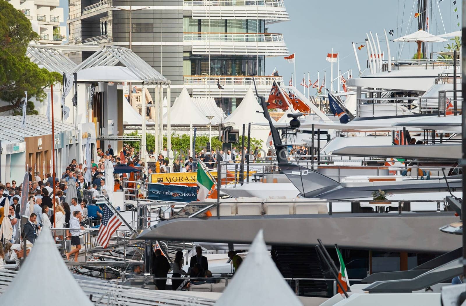 Monaco, Monte Carlo, 29 September 2022 - The famous motorboat exhibition, mega yacht show, clients and yacht brokers discuss the novelties of the boating industry, look at the mega yachts presented. High quality photo