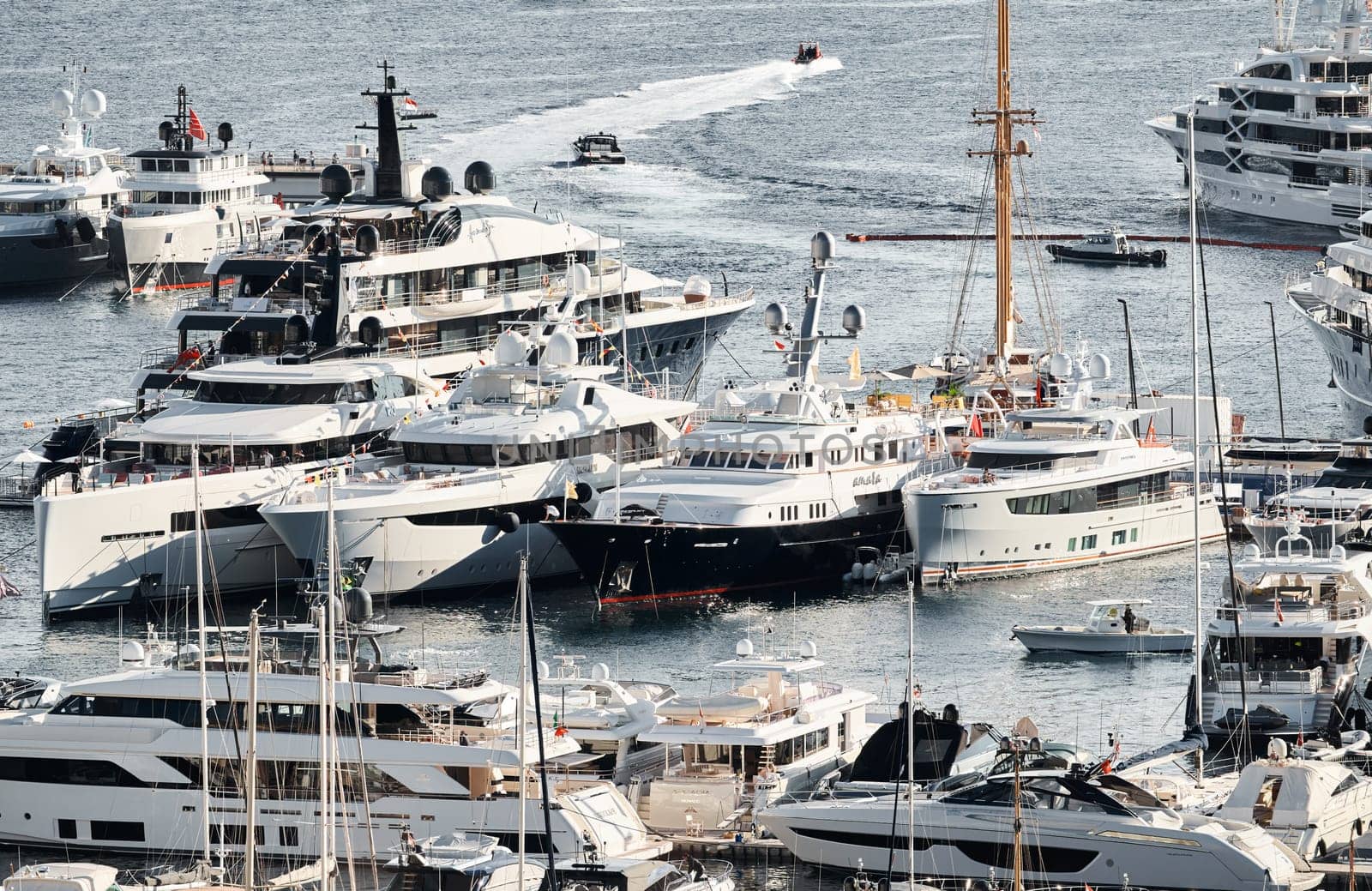 Monaco, Monte Carlo, 01 October 2022 - The famous motorboat exhibition at morning, mega yacht show, novelties of the boating industry. High quality photo