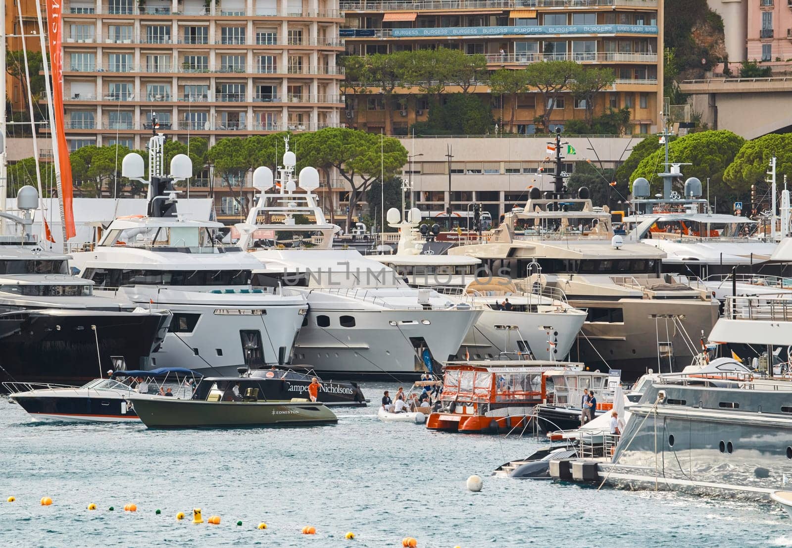 Monaco, Monte Carlo, 29 September 2022 - a lot of luxury yachts at the famous motorboat exhibition, the most expensive boats for the richest people, yacht brokers, boat traffic. High quality photo