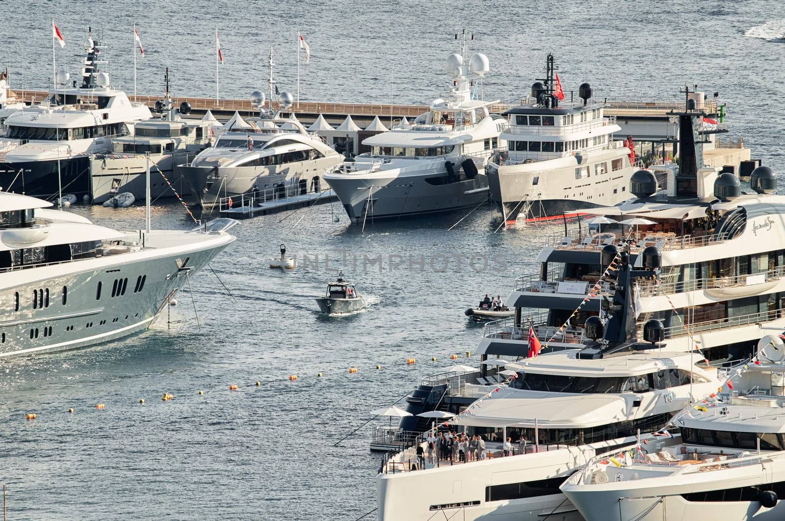 Monaco, Monte Carlo, 01 October 2022 - The famous motorboat exhibition at morning, mega yacht show, novelties of the boating industry. High quality photo