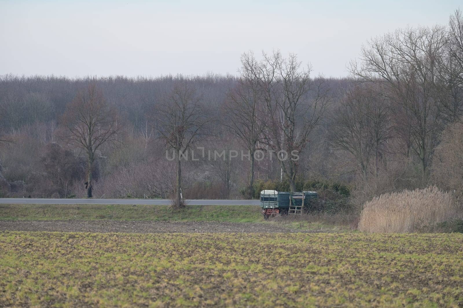 Agricultural trailer in a field near Meerbusch, Germany by rherrmannde