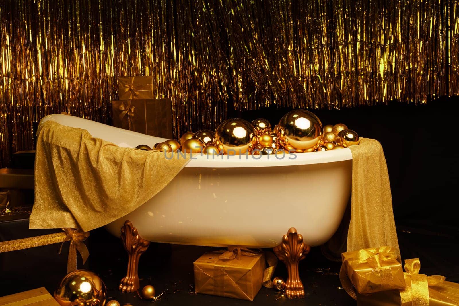 Bathtub full of golden balls. Vintage bright bathroom decorated with festive golden balls. New Year, Christmas bathroom interior. by Matiunina