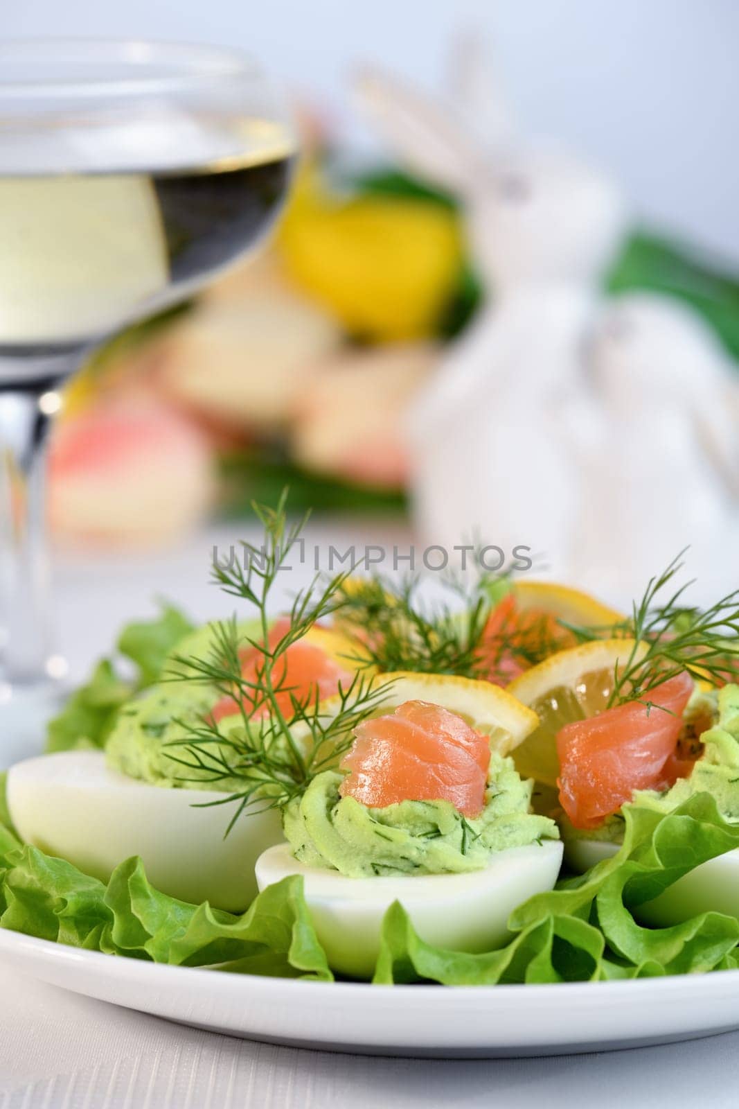 Stuffed eggs with avocado and salmon by Apolonia