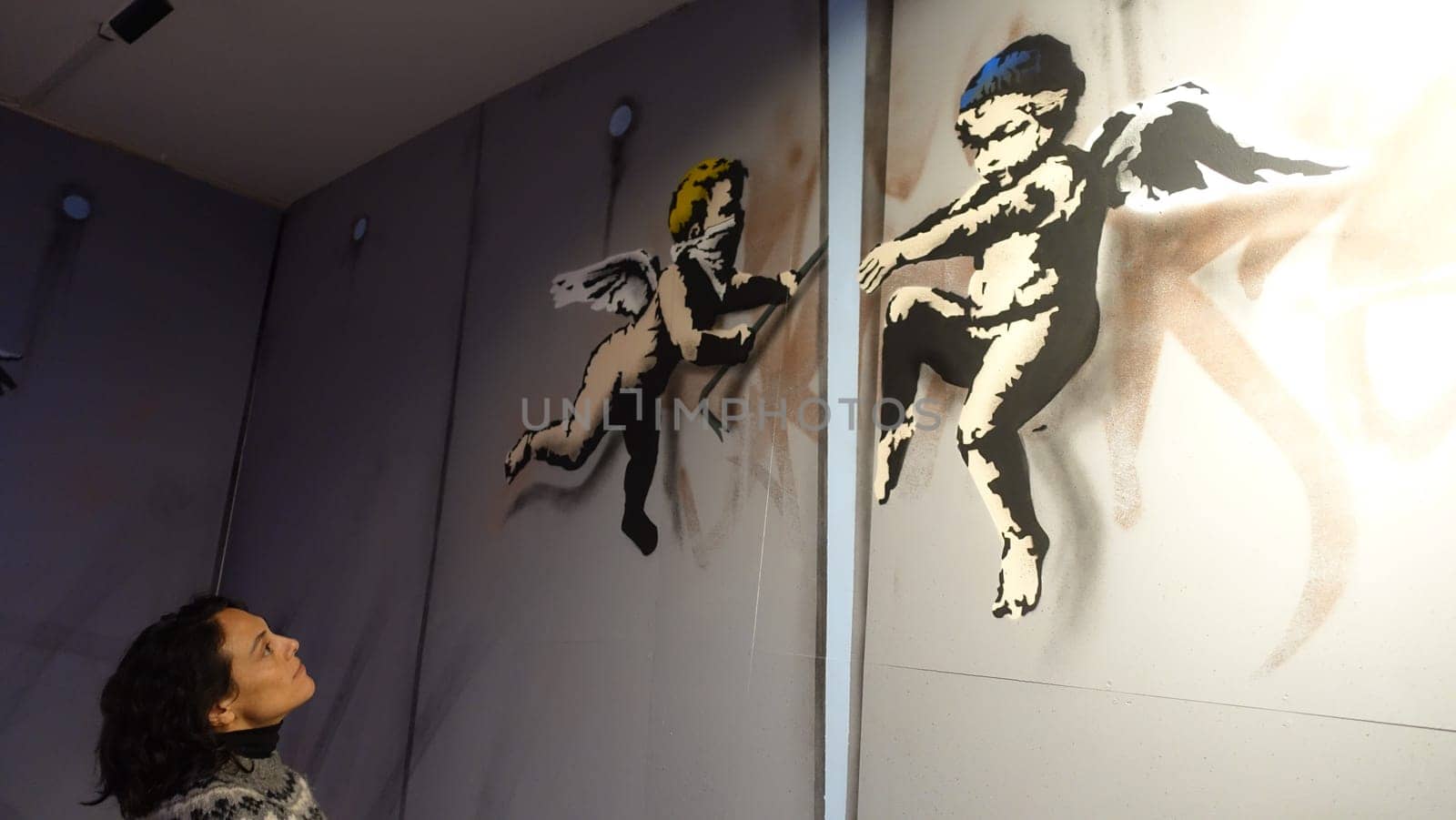 Stockholm, Sweden, December 29 2023. Art exhibition. The mystery of Banksy. A genius mind. Angels.