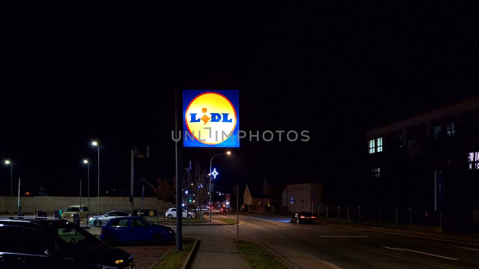 HUSTOPECE, CZECH REPUBLIC - DECEMBER 17, 2023: LIDL logo on hypermarket from German chain, part of Schwartz Gruppe which also owns Kaufland. Lidl is a German international discount retailer chain that operates over 12,000 stores, present in every member state of the European Union, Serbia, Switzerland, the United Kingdom and the United States.