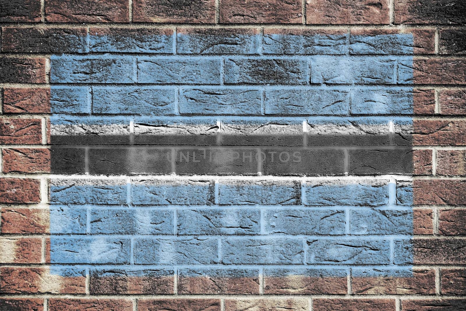 A Botswana flag on brick wall background