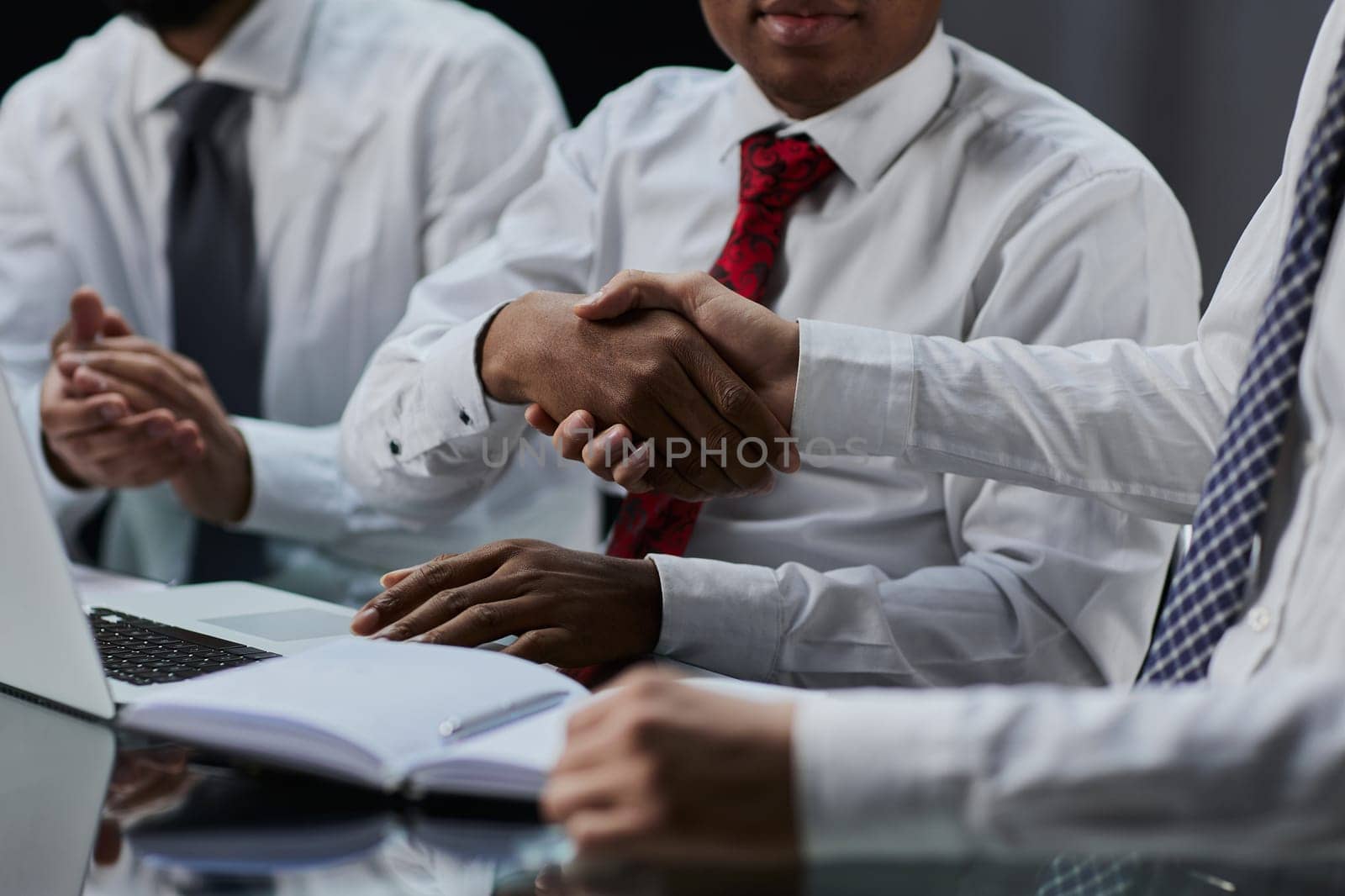 businessman shakes hands, making a deal with a lawyer. male judge legal by Prosto