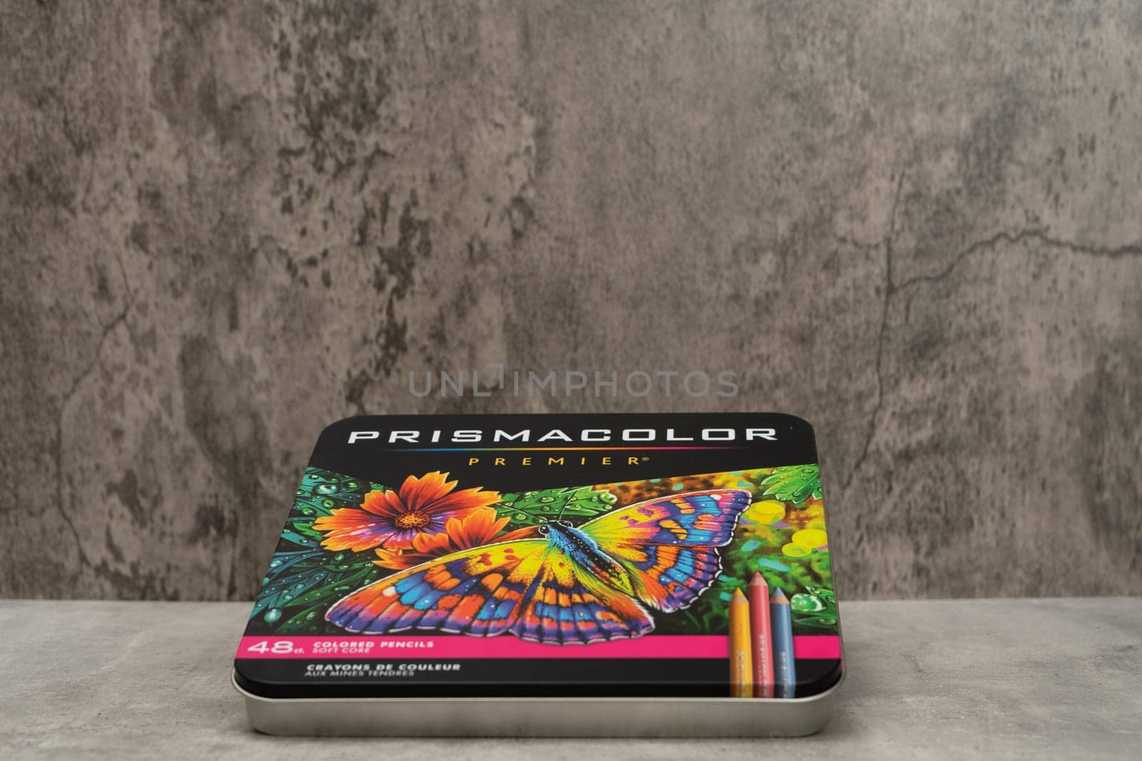 Burriana, Spain 12-30-2023: Product image of a metal box of colored pencils from the Prismacolor brand on a gray background by Barriolo82