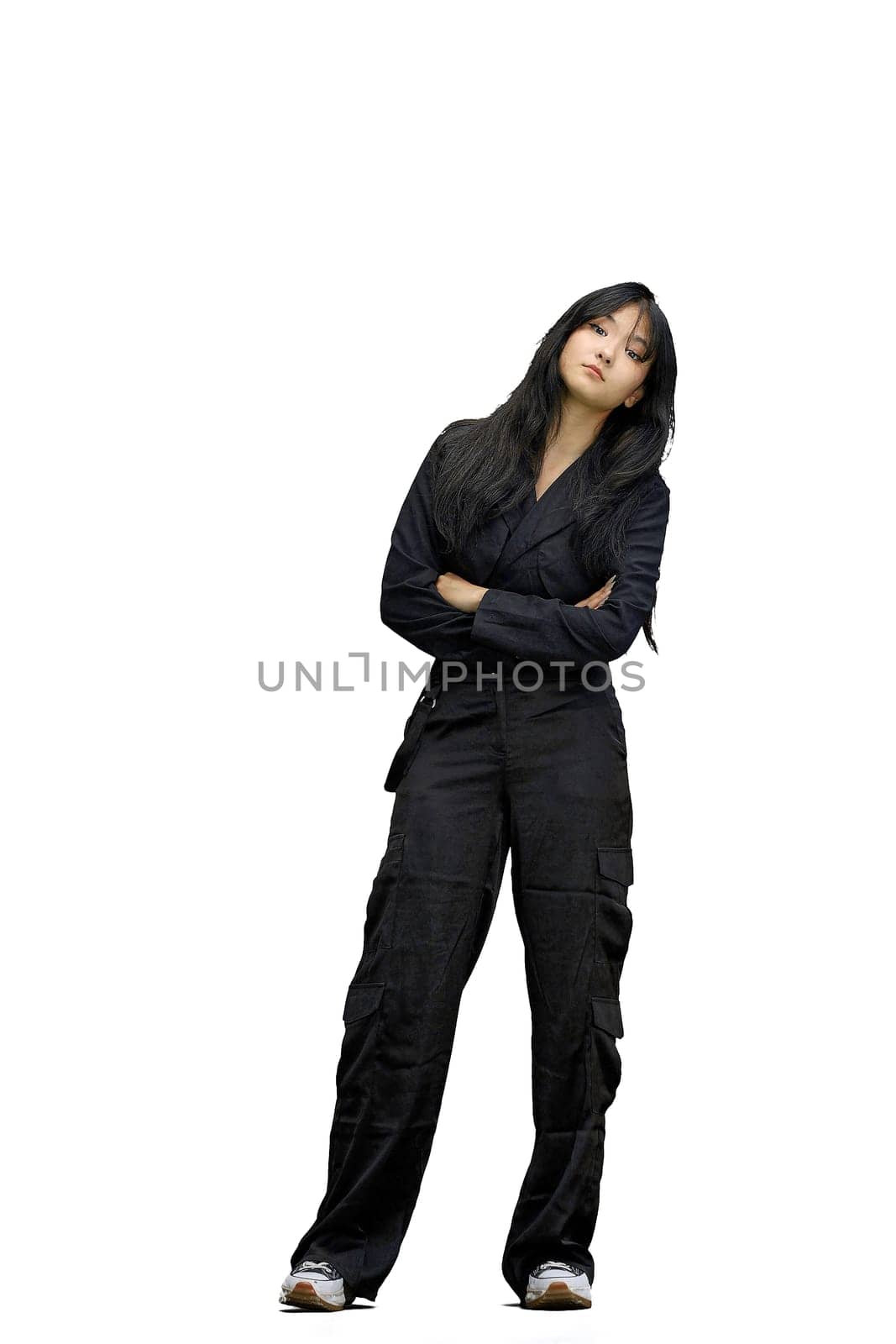 A woman in black clothes, on a white background, in full height, crossed her arms by Prosto