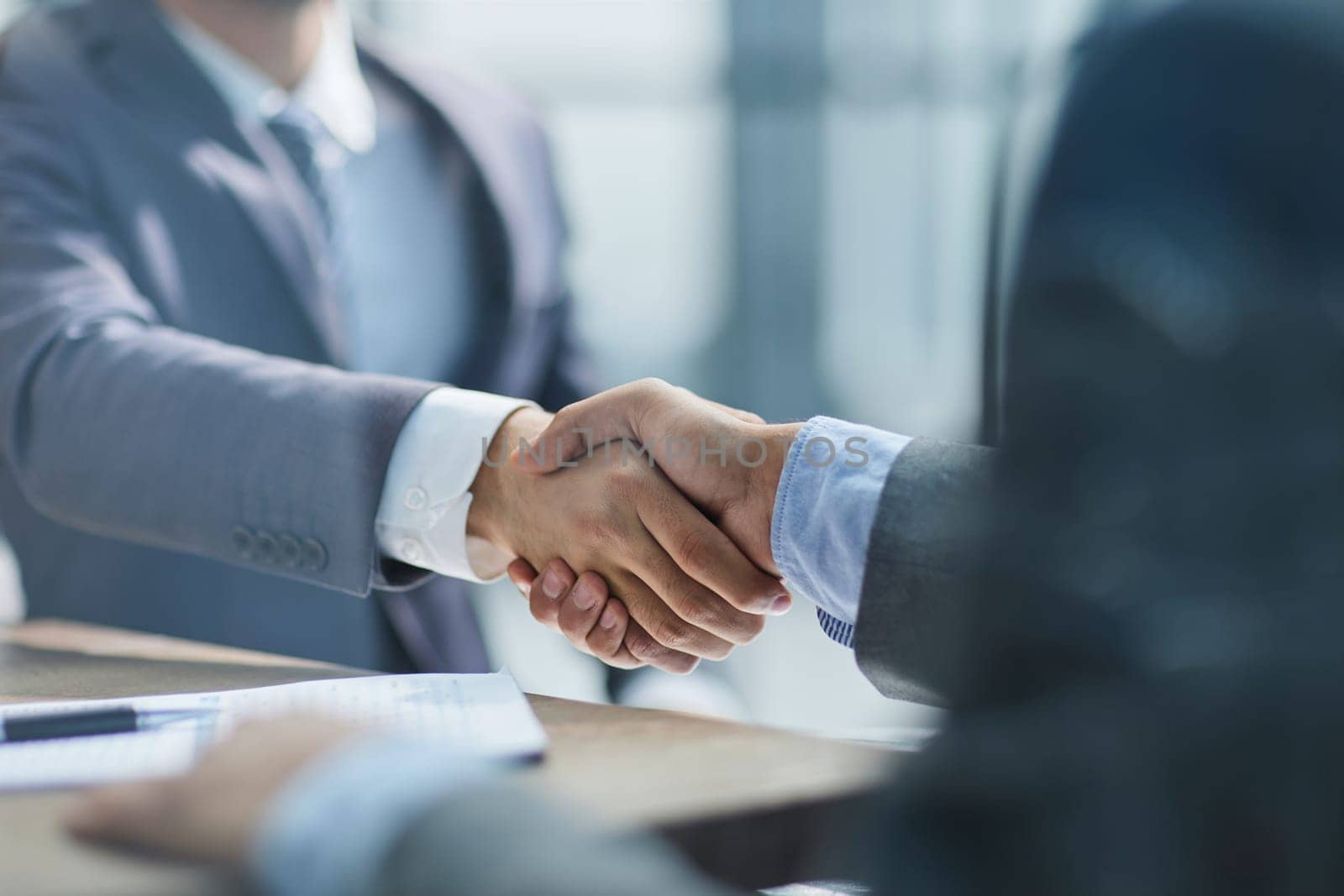 Businessman handshake for teamwork of business merger and acquisition by Prosto