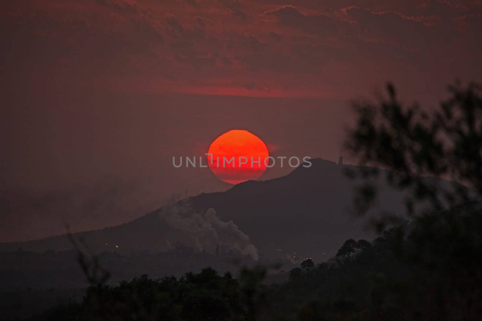 Sugar mill near Malelane, Mpumalanga Province, as een at sunrise from Kruger National Park, South Africa