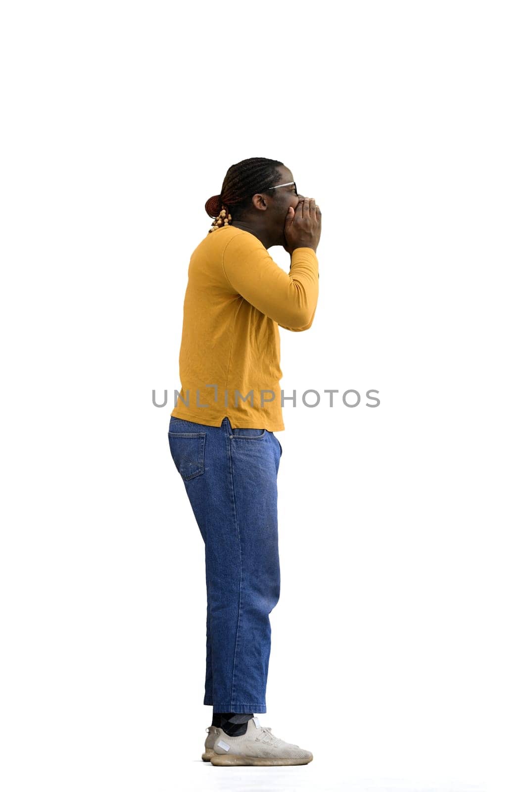 A man in a yellow jacket on a White background calls, in profile by Prosto