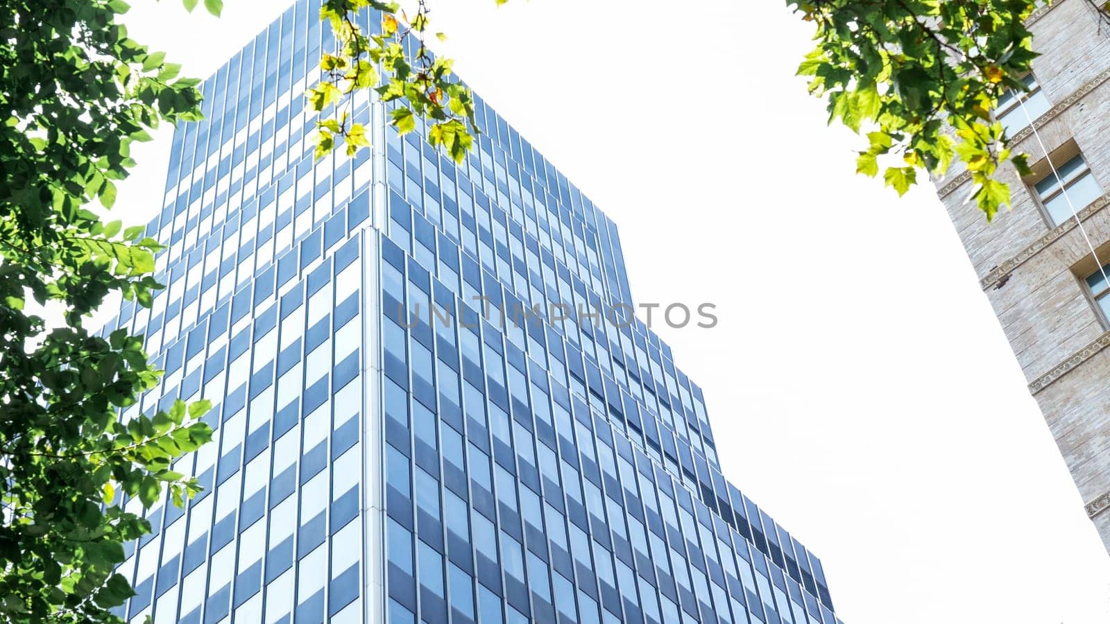 Skyscraper with glassy facade. Building in metropolis city. New York downtown with skyscraper. Business center by JuliaDorian