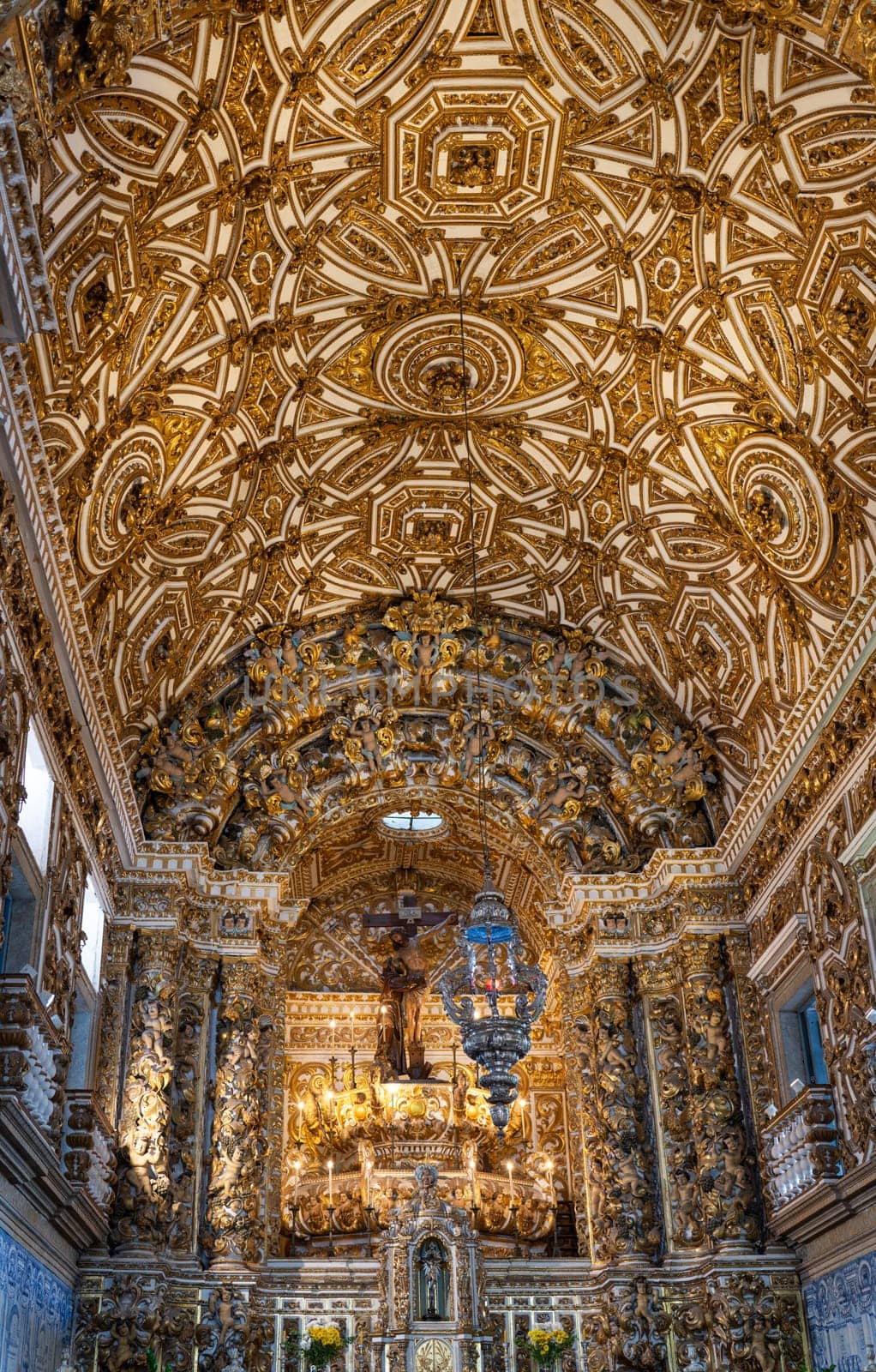 Baroque ceiling with gold leaf in historic church.