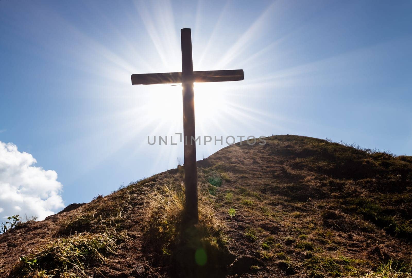 wooden cross on a mountain light by sunbeams , easter concept of the cross in golgotha, ai generated