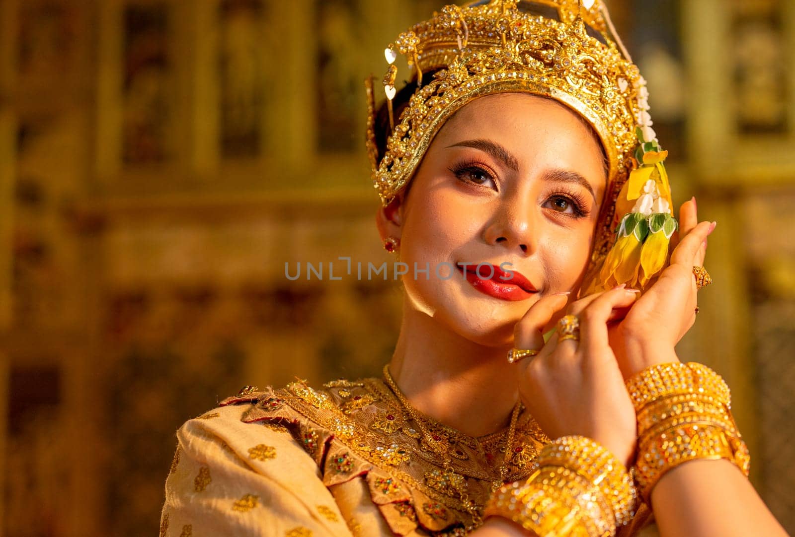 Close up beautiful Asian woman dress with Thai ancient traditional costume.