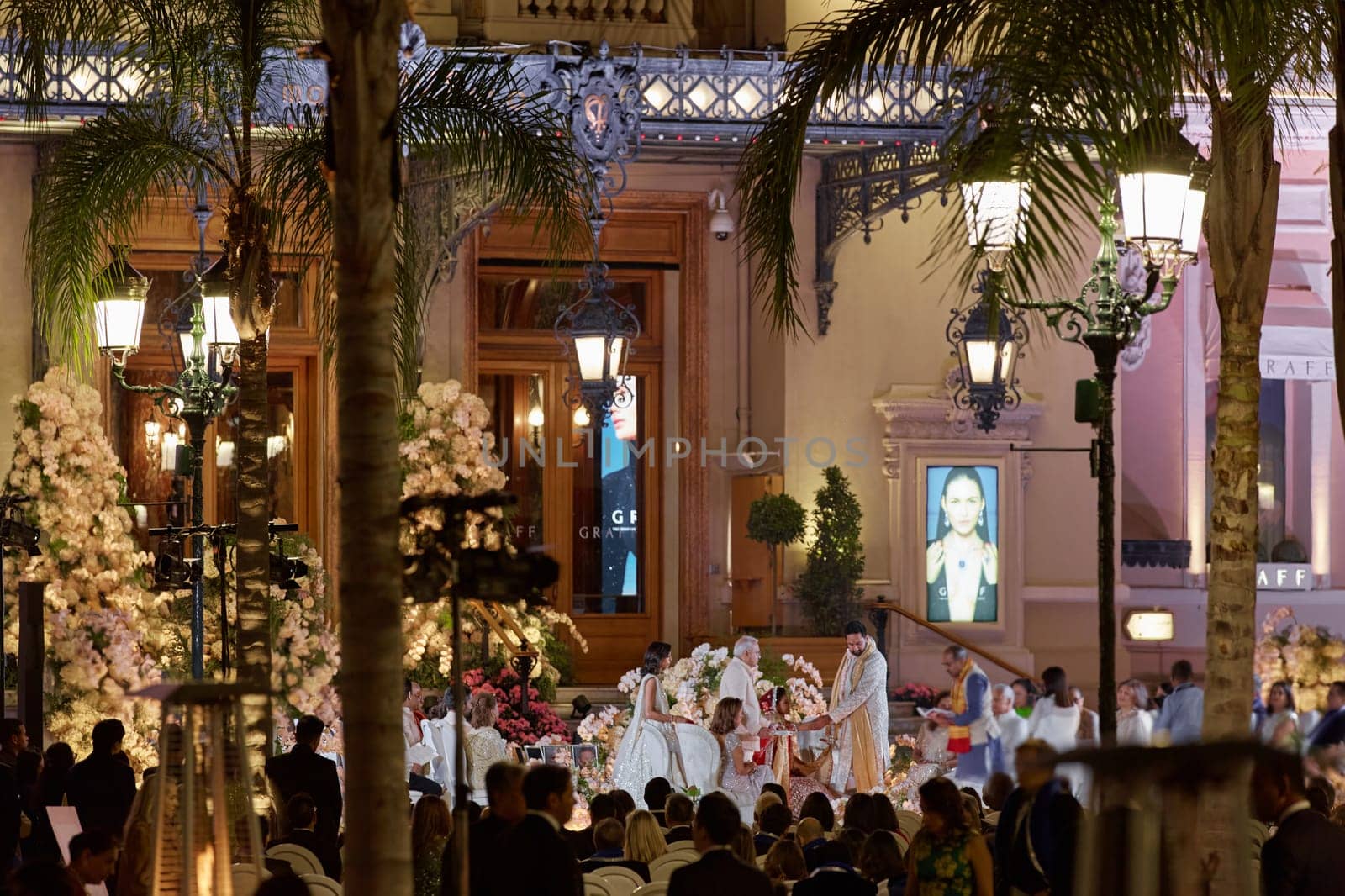 Monaco, Monte-Carlo, 12 November 2022: The Indian wedding celebration in the square of the famous Casino Monte-Carlo is at night, attraction night illumination. High quality photo