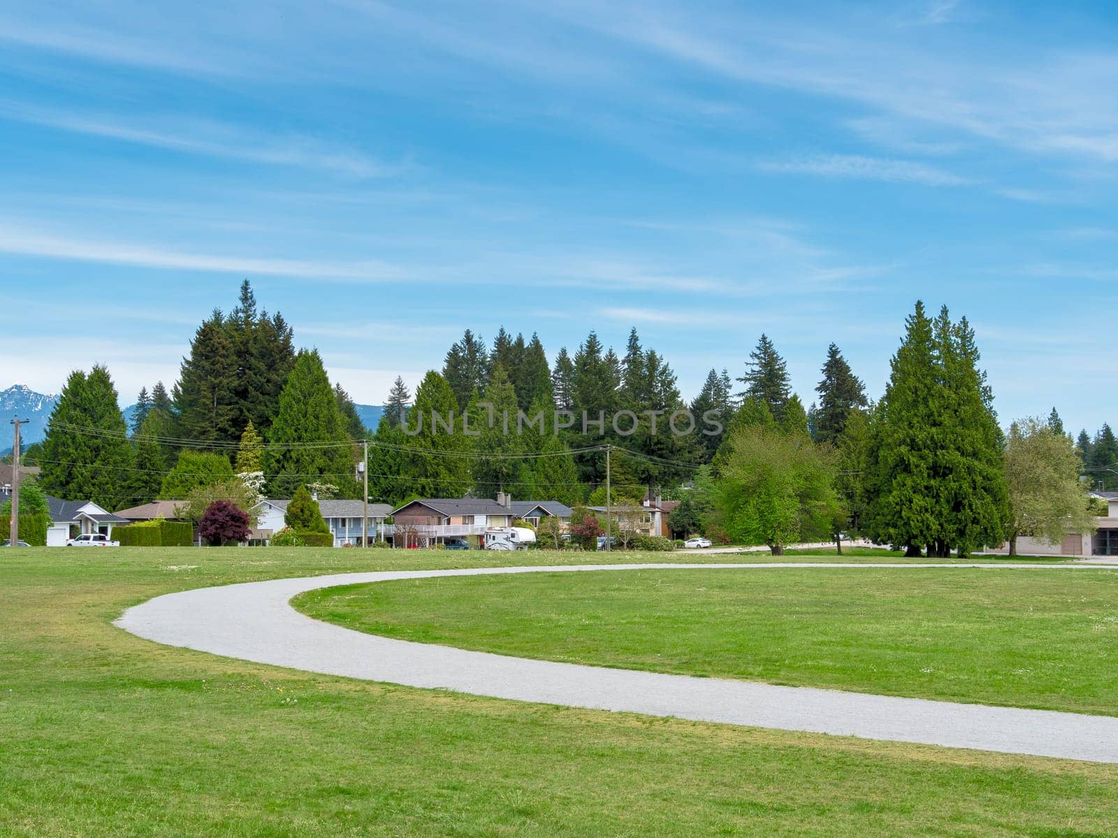 Gravel jogging track in recreational park in residential are of Vancouver, Canada.