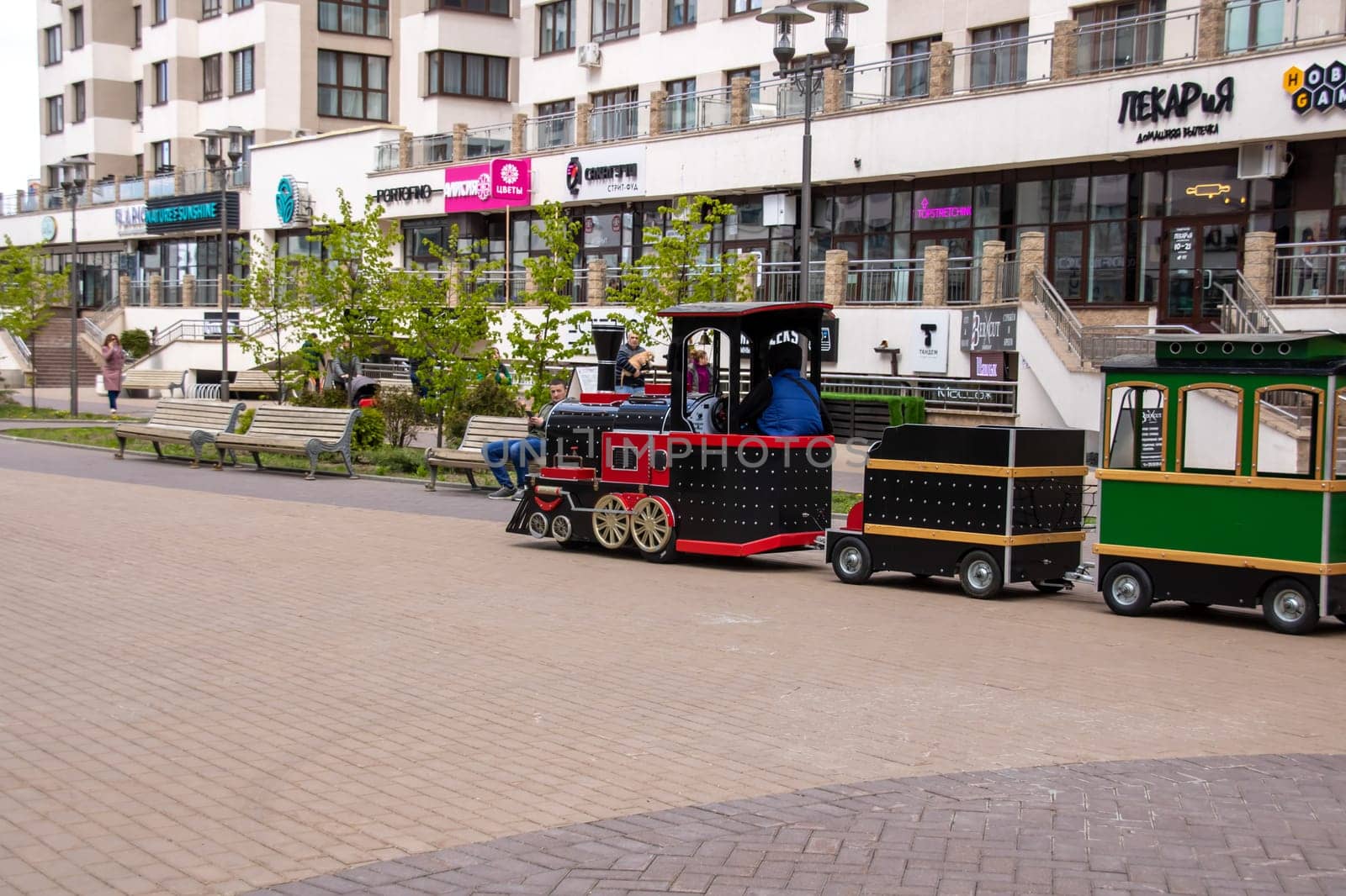 Belarus, Minsk - 7 june, 2023: Children's train rides down the street close up