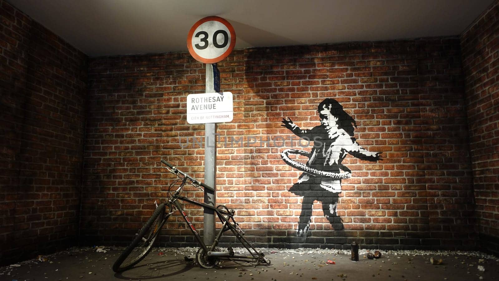 Stockholm, Sweden, December 29 2023. Art exhibition. The mystery of Banksy A genius mind. Little girl.