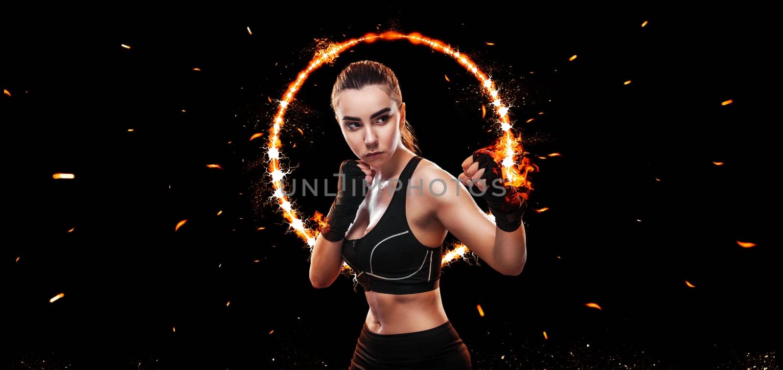 Street fighter female isolated on black background with copy Space. Action shot. Sport concept.