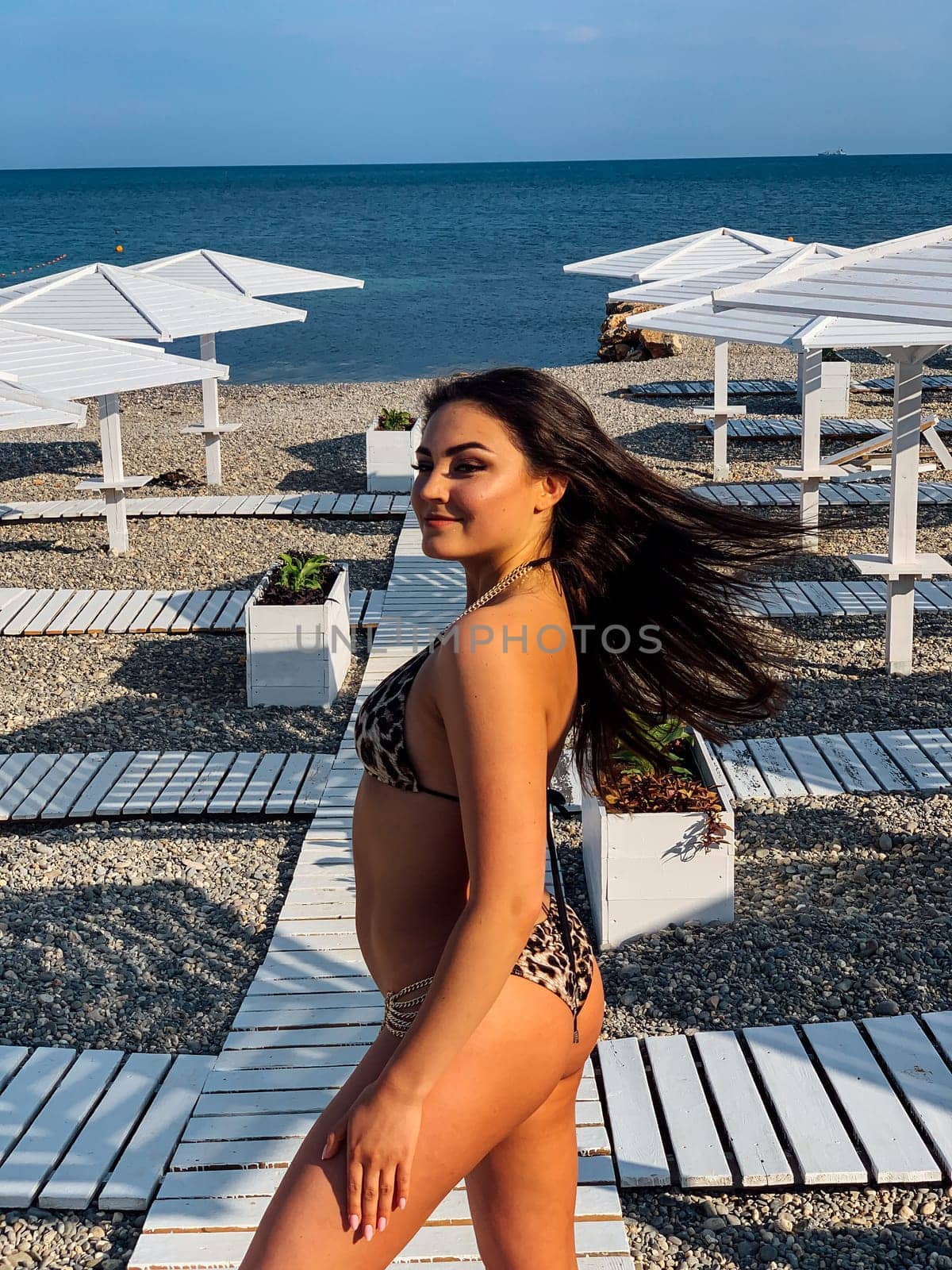 woman in swimsuit on the beach vacation tan by Simakov