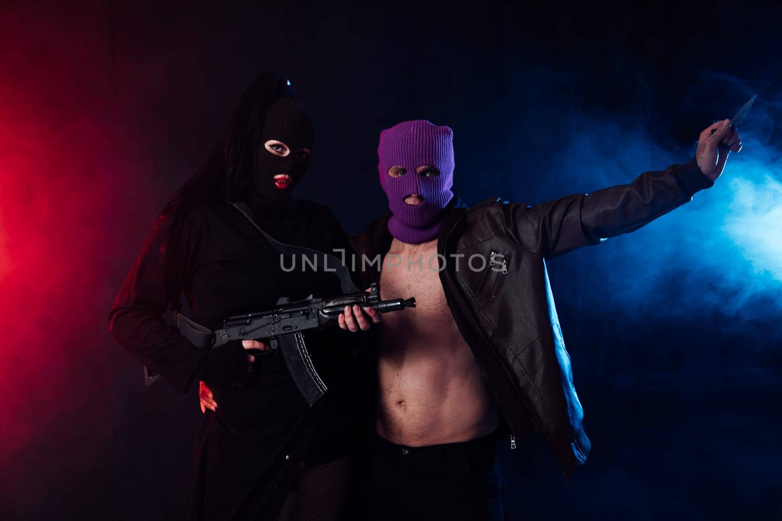 masked terrorists with weapons in the smoke by Simakov