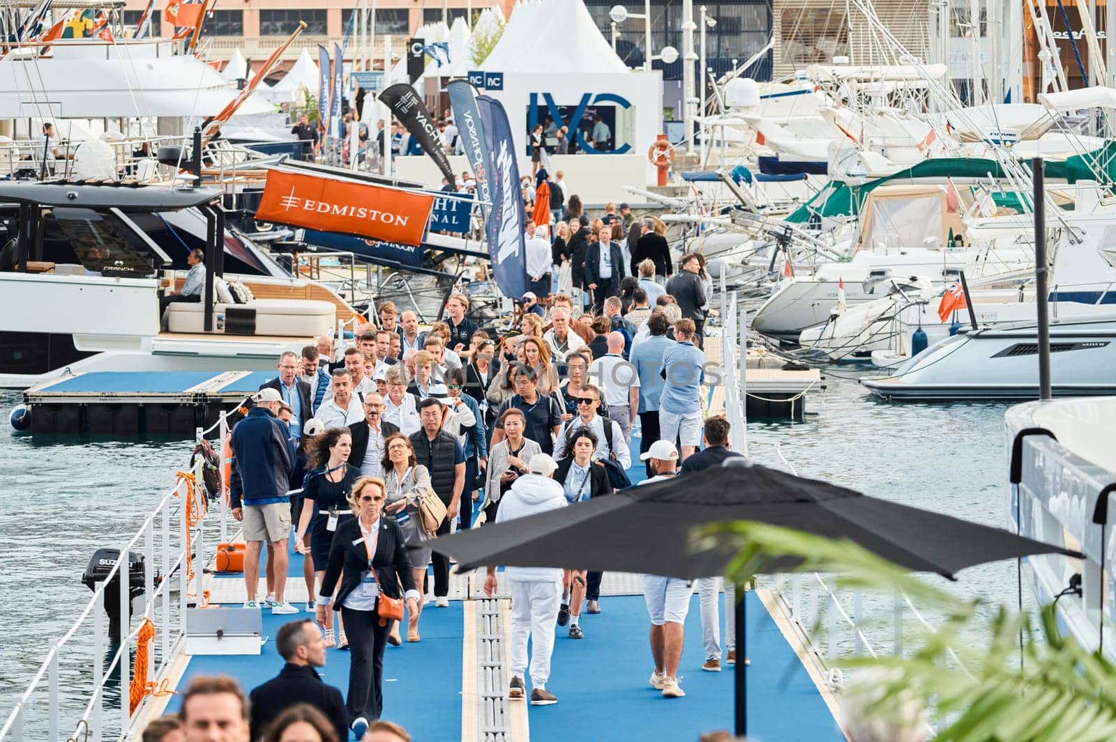 Monaco, Monte Carlo, 29 September 2022 - The famous motorboat exhibition, mega yacht show, clients and yacht brokers discuss the novelties of the boating industry, look at the mega yachts presented by vladimirdrozdin