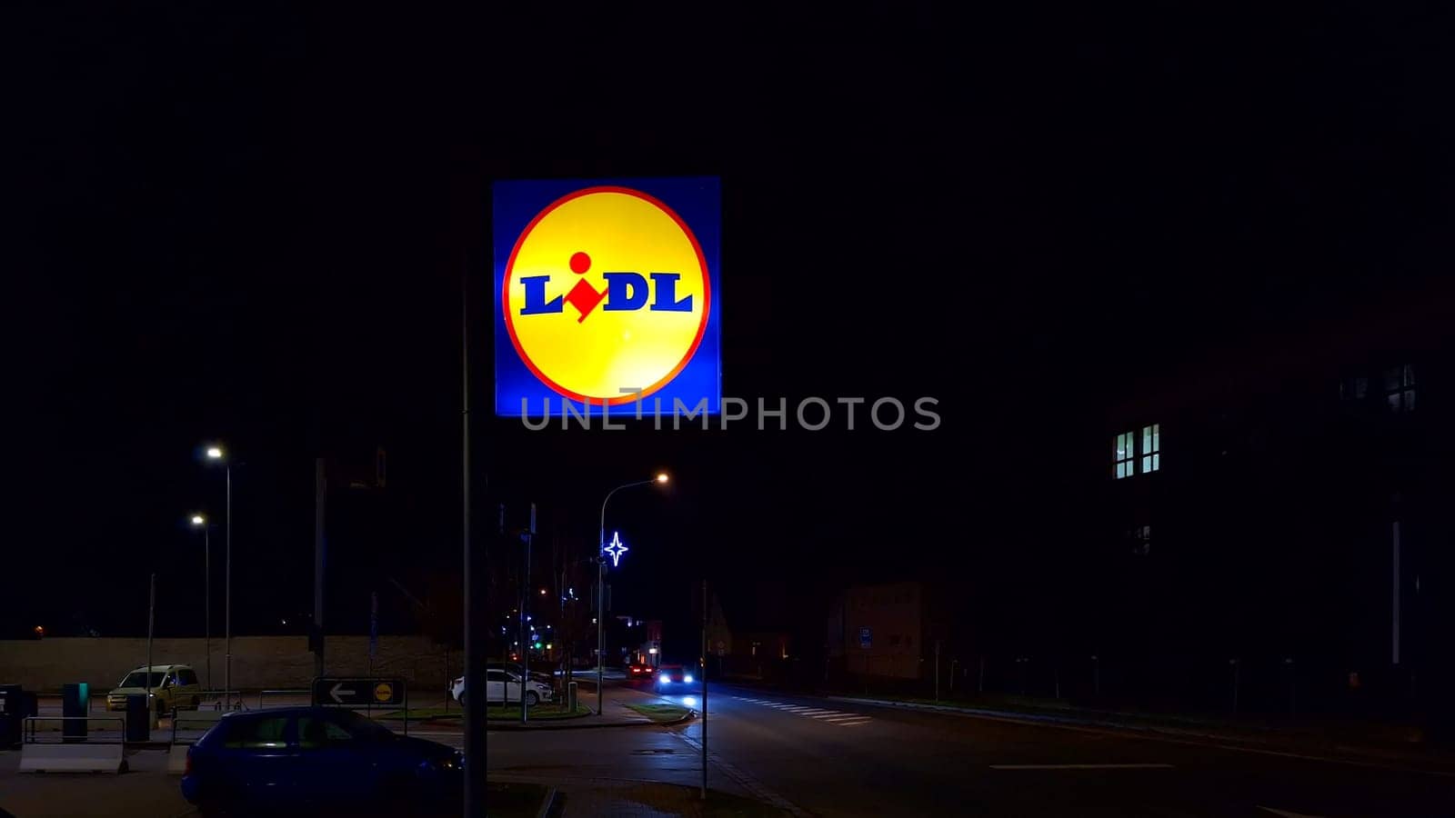 HUSTOPECE, CZECH REPUBLIC - DECEMBER 17, 2023: LIDL logo on hypermarket from German chain, part of Schwartz Gruppe which also owns Kaufland. Lidl is a German international discount retailer chain that operates over 12,000 stores, present in every member state of the European Union, Serbia, Switzerland, the United Kingdom and the United States.