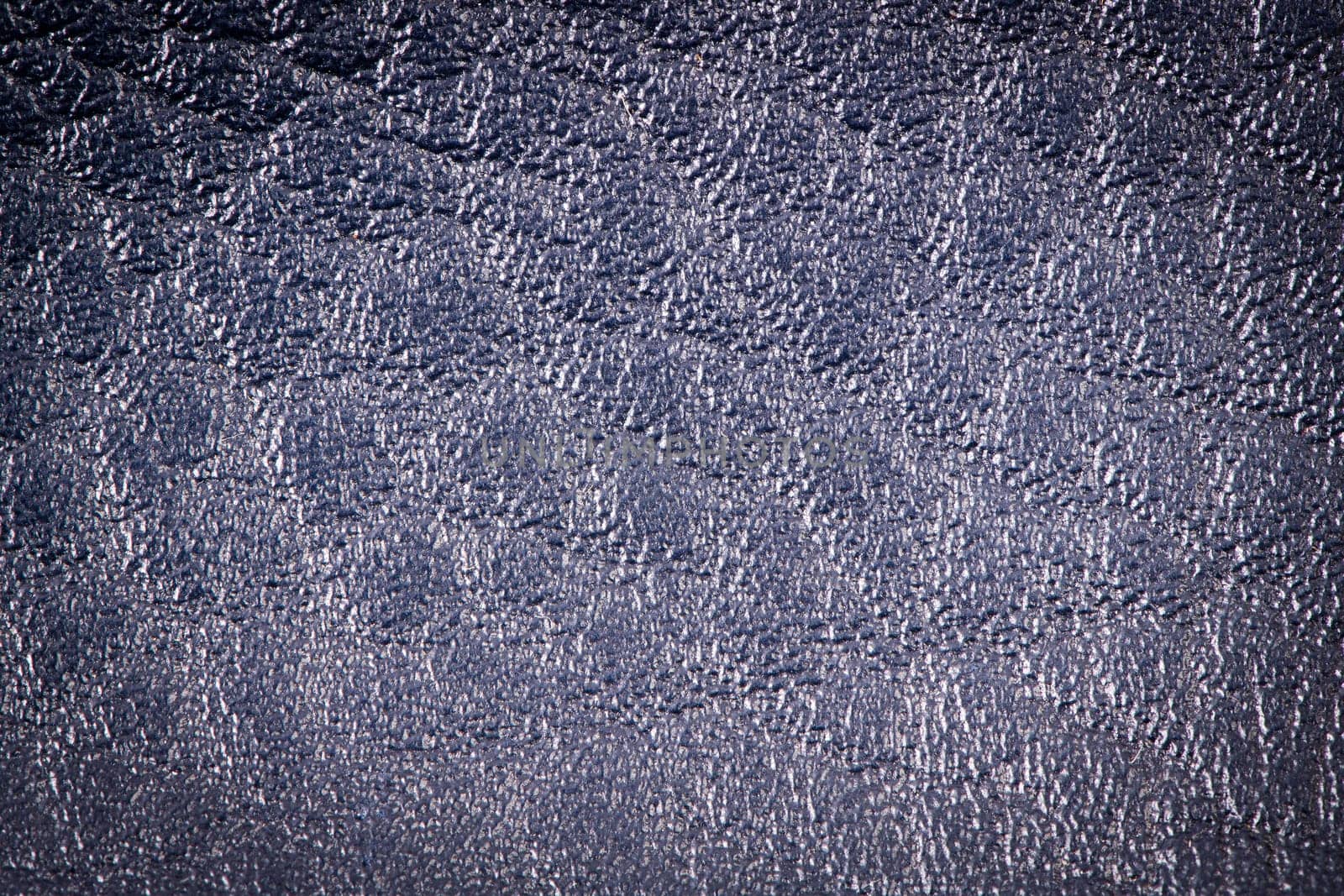 Blue leather texture closeup detailed background.