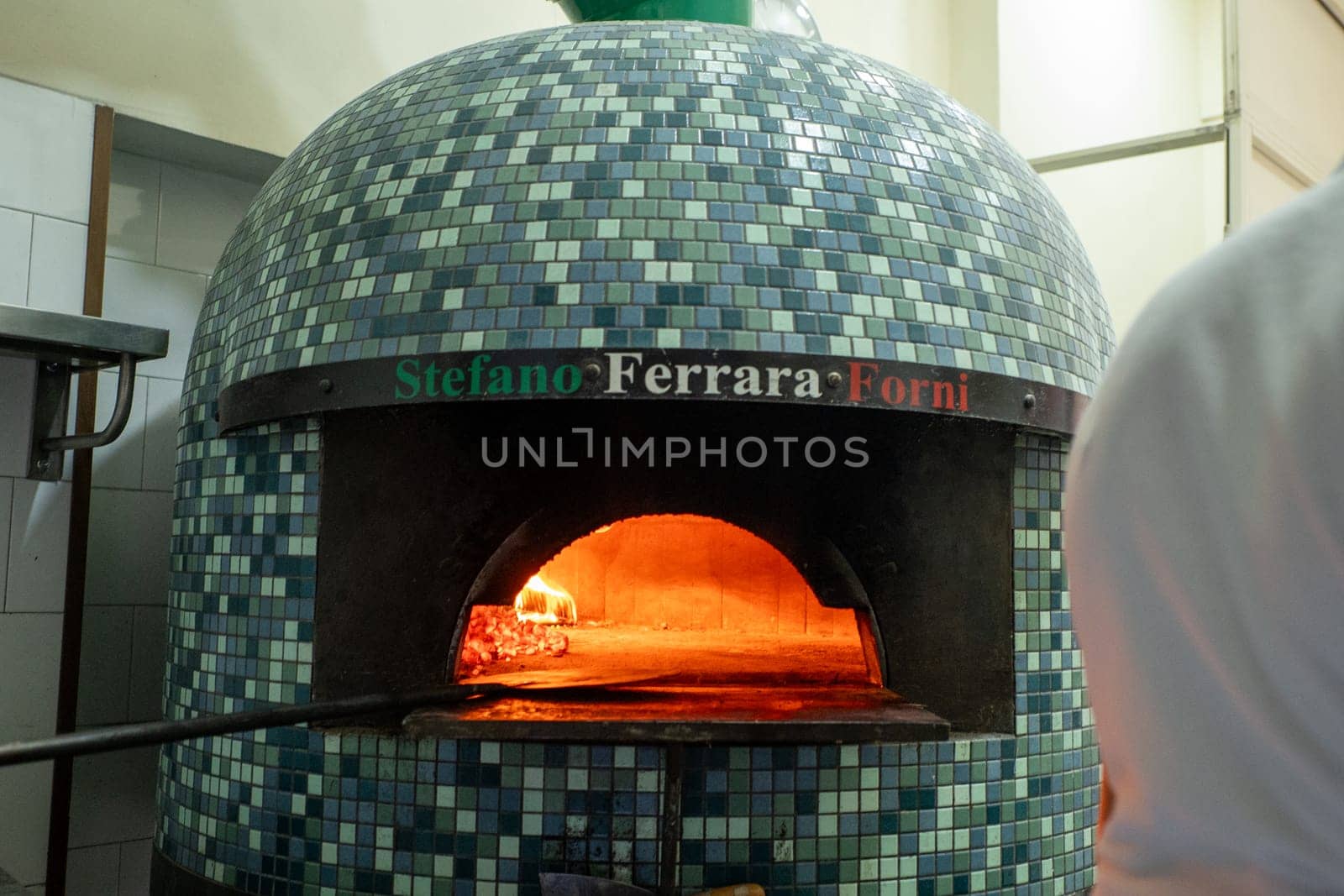 Napoli, Italy: 2023 November 18: Typical Neapolitan oven in La Antica Pizzeria Da Michele from 1870 where the authentic Margherita pizza is made,