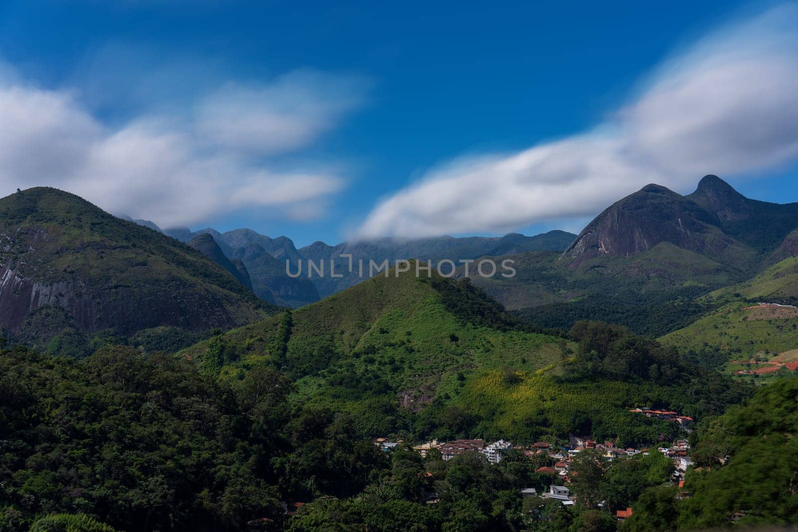Impressive Petropolis Mountains with Blurry Clouds and Rural Village by FerradalFCG