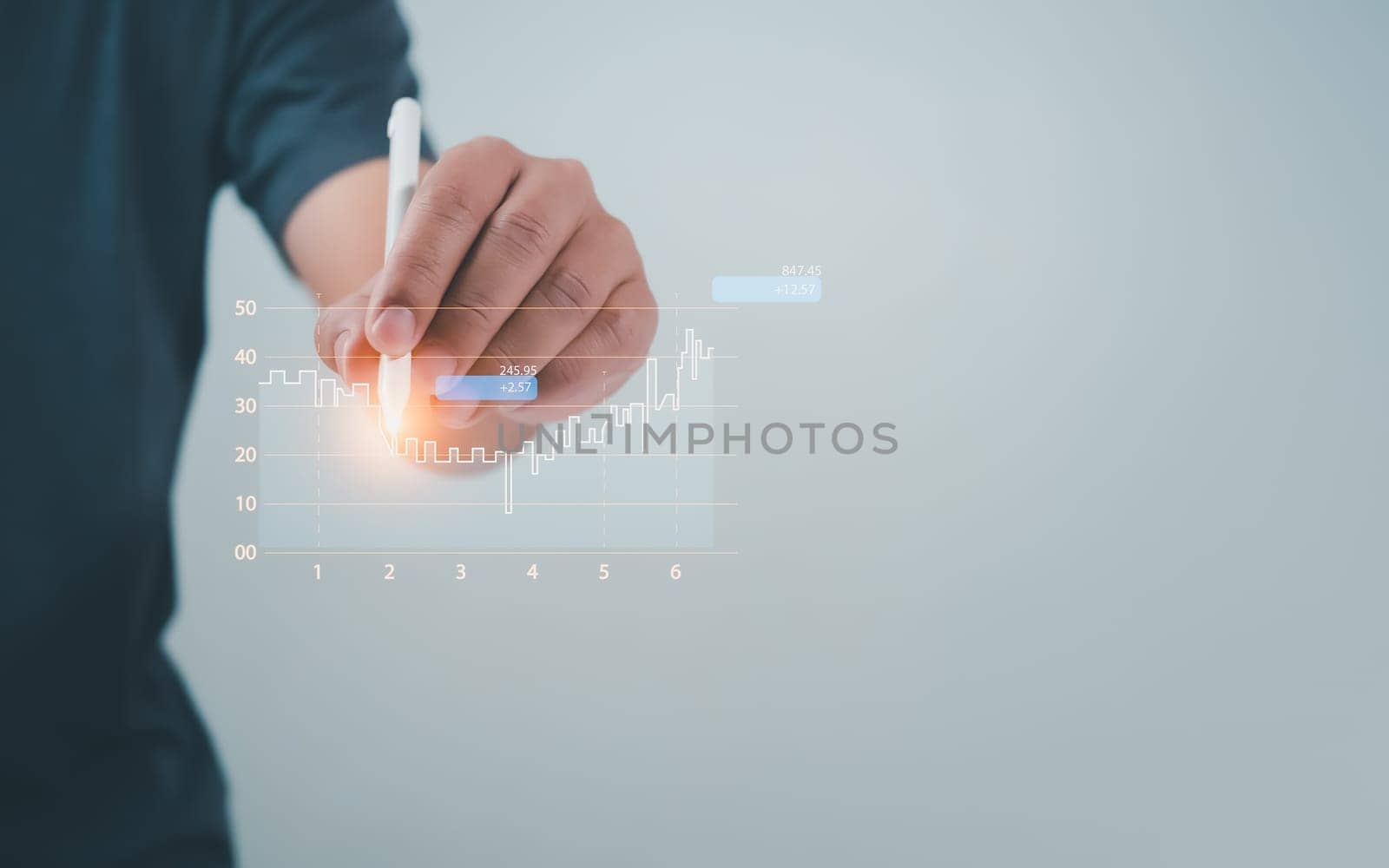 Stock market, Business growth, progress or success concept. Businessman or trader is showing a growing virtual hologram stock, invest in trading. by Unimages2527