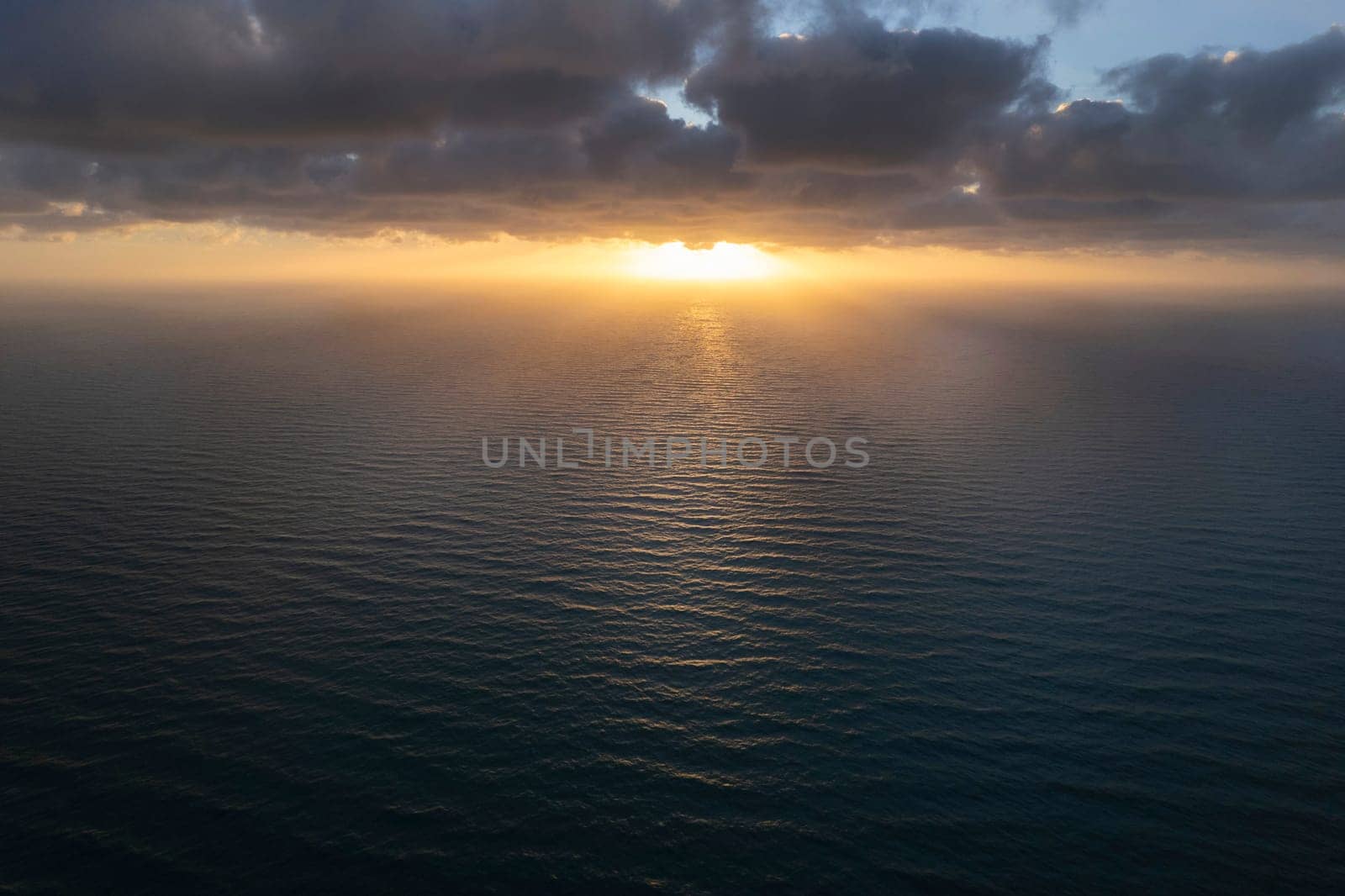 Aerial view of a sunset over the Mediterranean sea  by fotografiche.eu