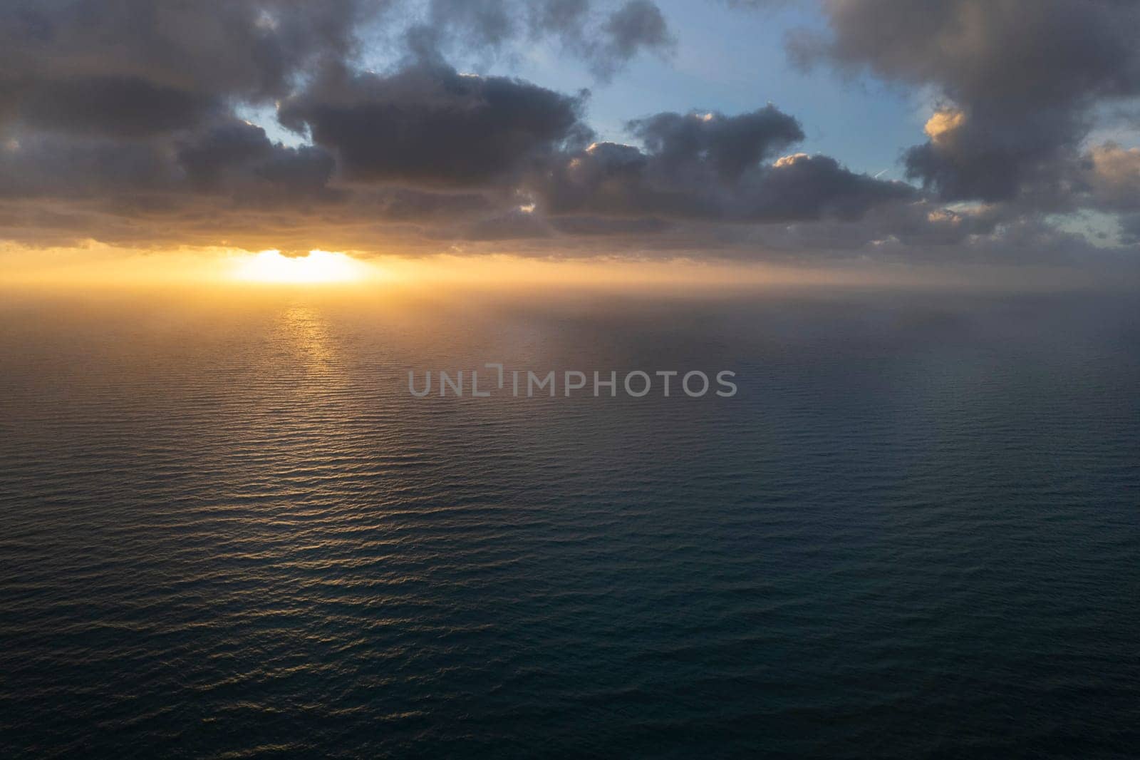 Aerial photographic documentation of a sunset over the Mediterranean sea 