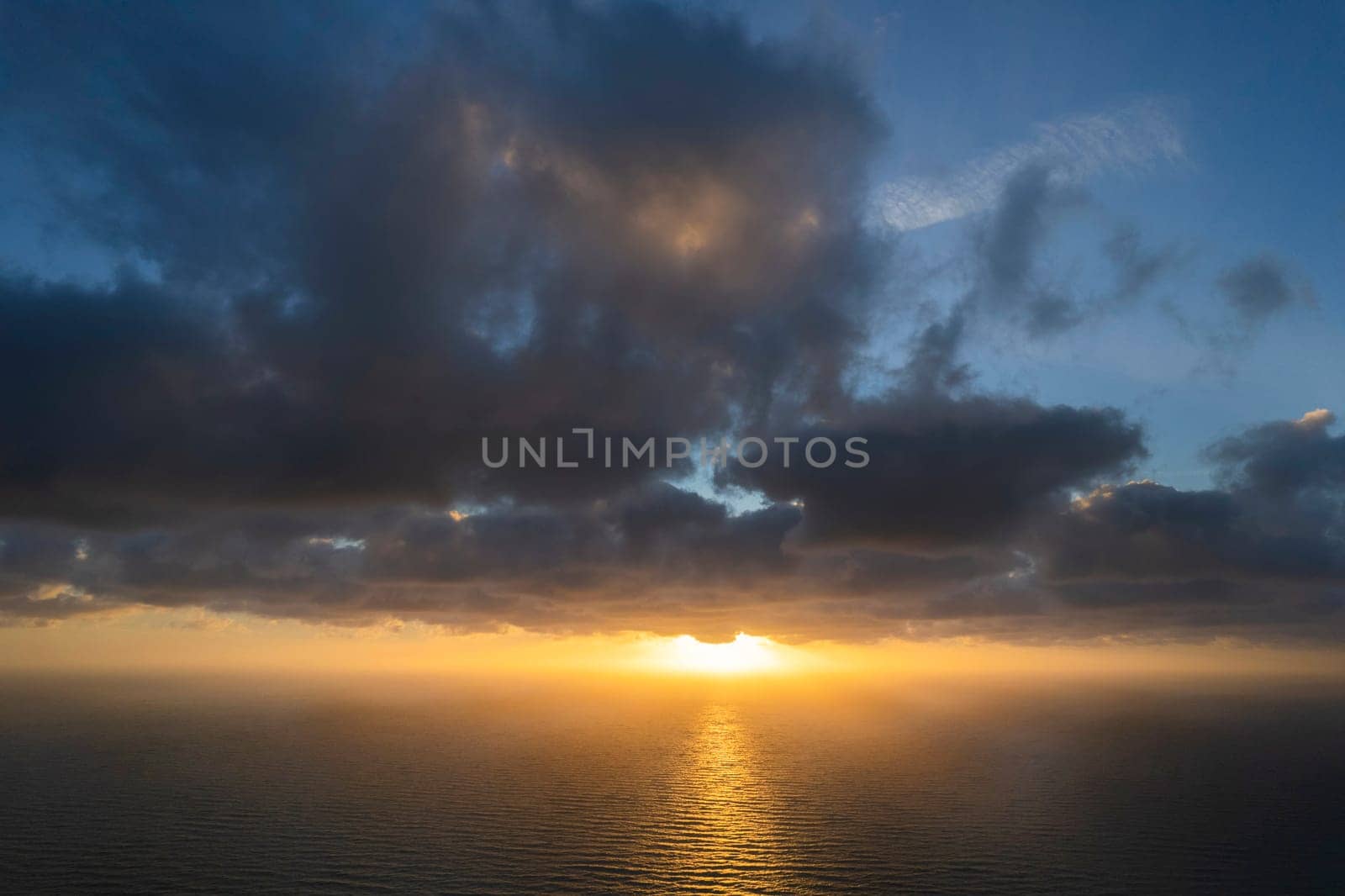 Aerial view of a sunset over the Mediterranean sea  by fotografiche.eu