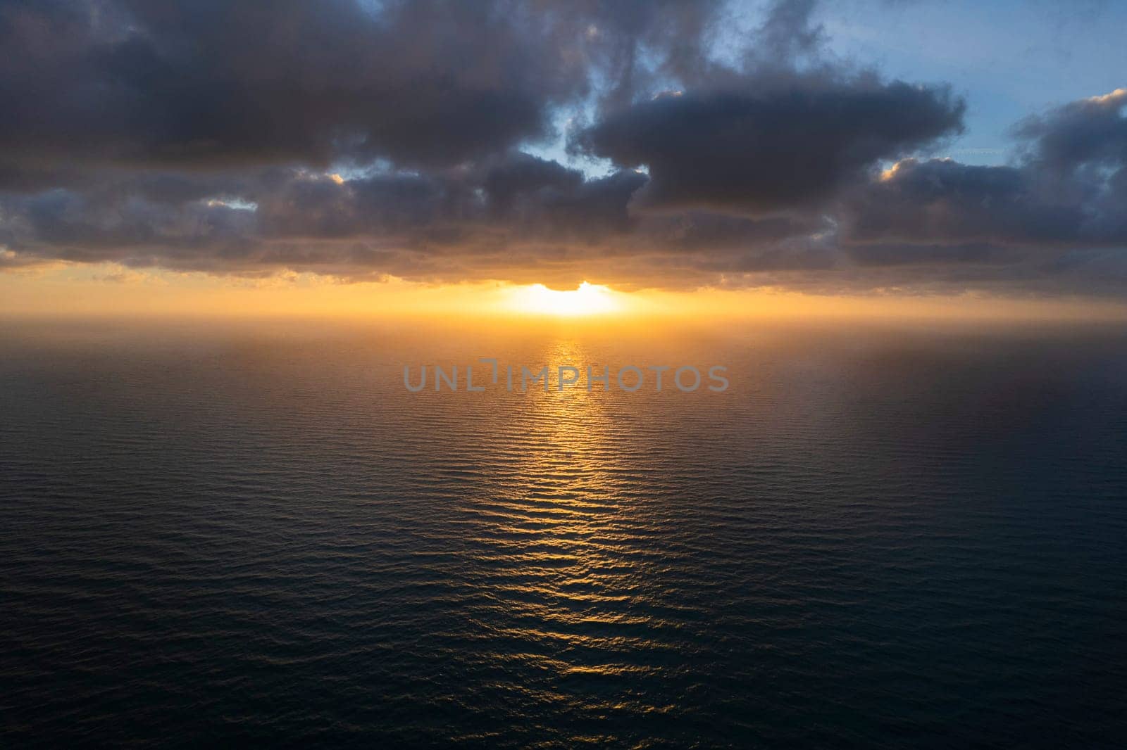 Aerial view of a sunset over the Mediterranean sea  by fotografiche.eu