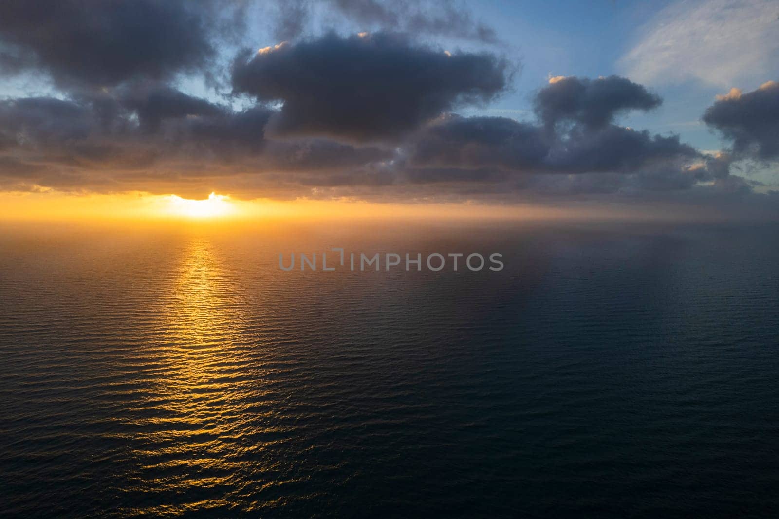 Aerial photographic documentation of a sunset over the Mediterranean sea 