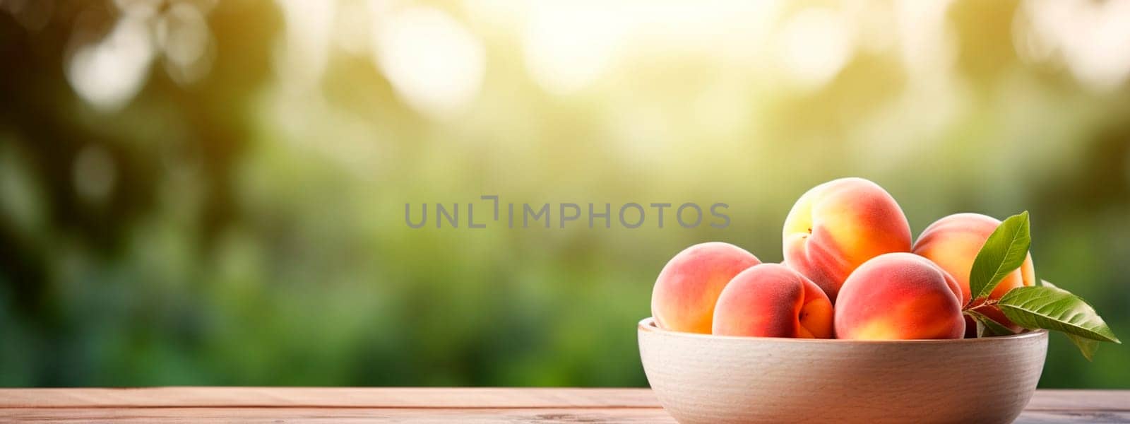 Peaches in a bowl in the garden. Selective focus. Food.