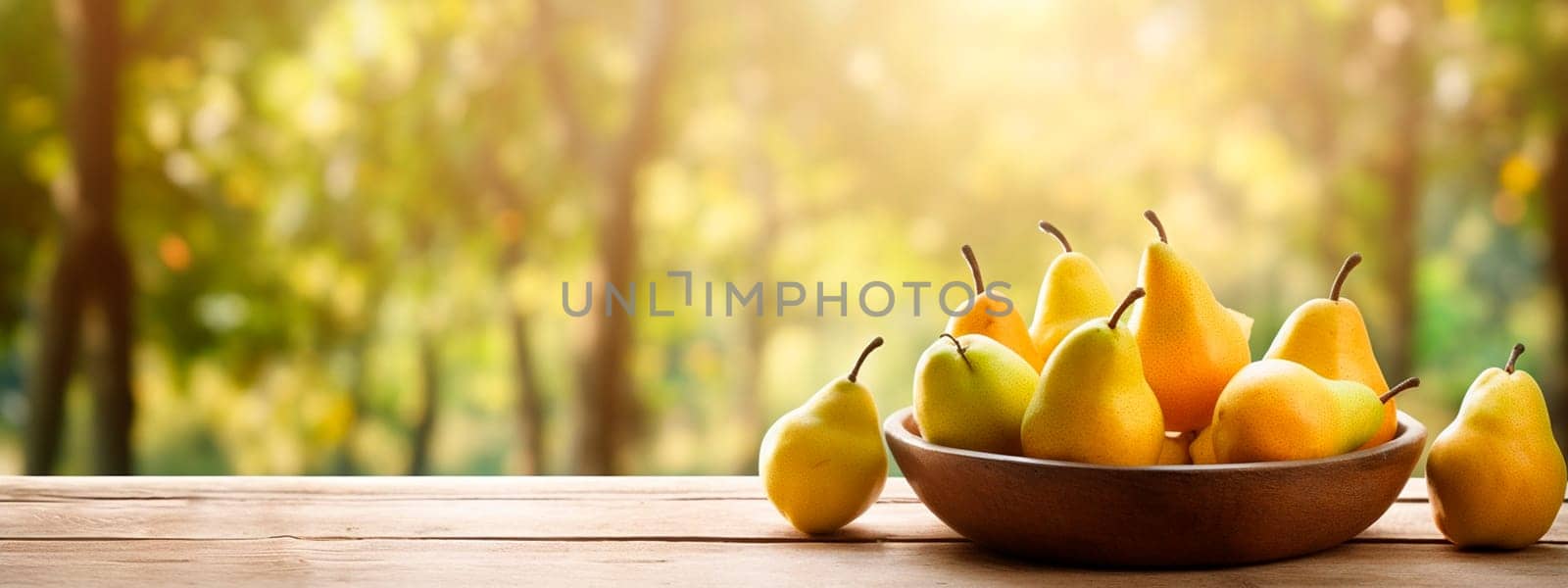 Pears in a bowl in the garden. Selective focus. by yanadjana