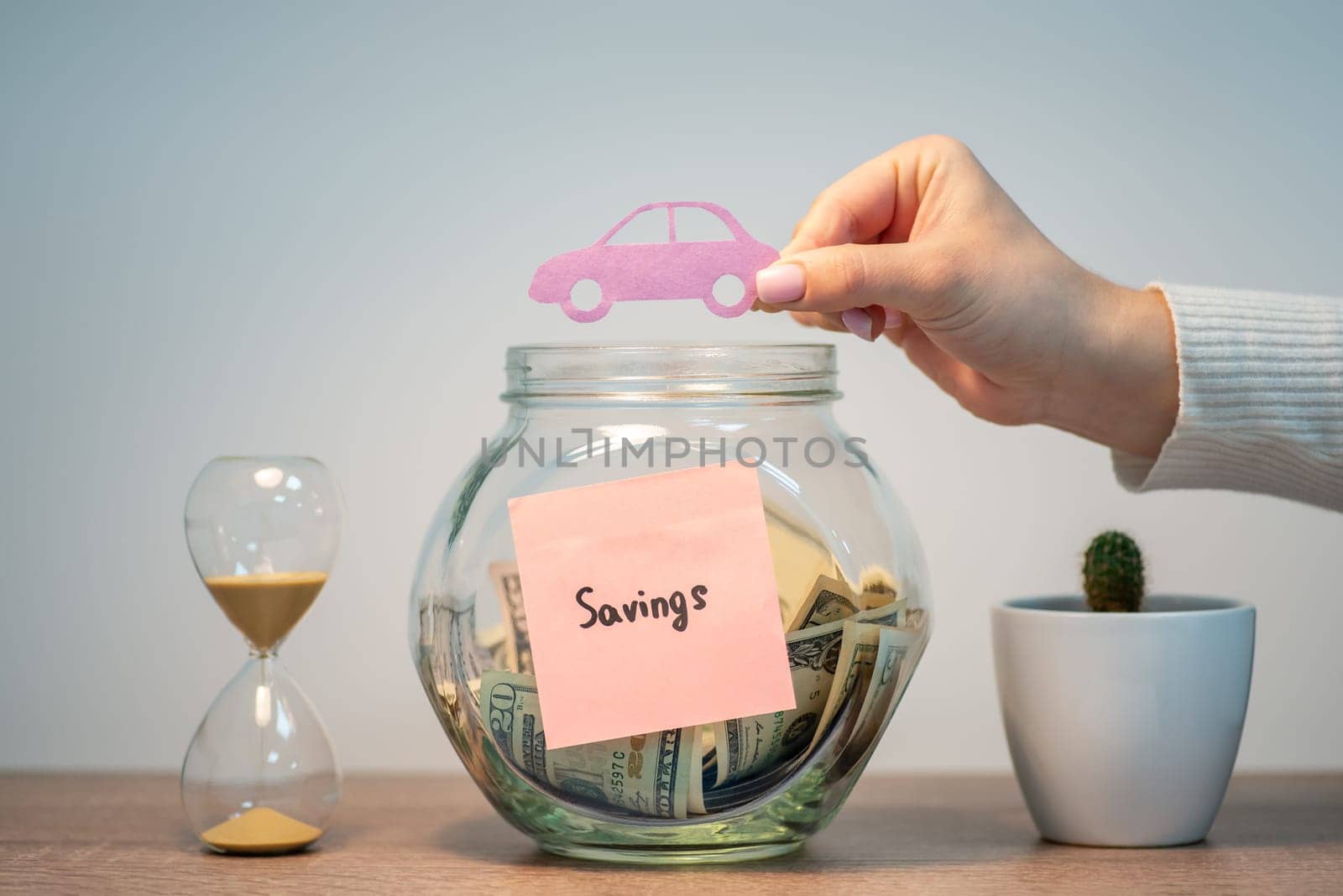 Concept of saving money and cash, financial planning, investing the vehicle and finance management