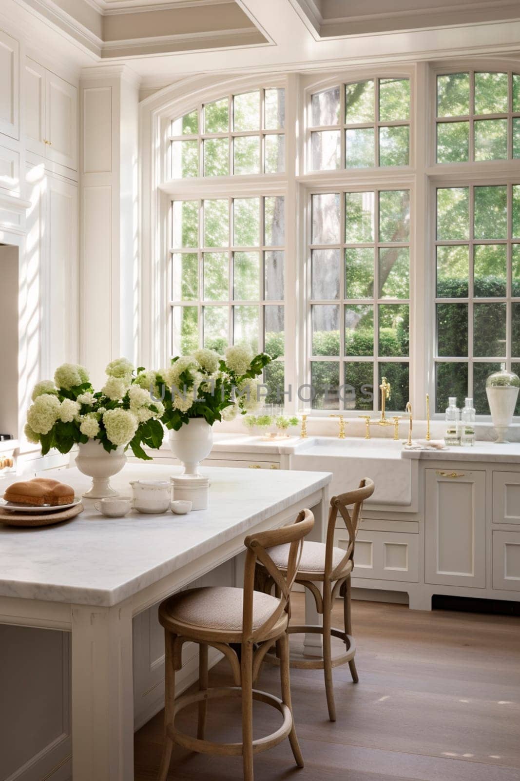 White kitchen with large windows. Selective focus. Nature.
