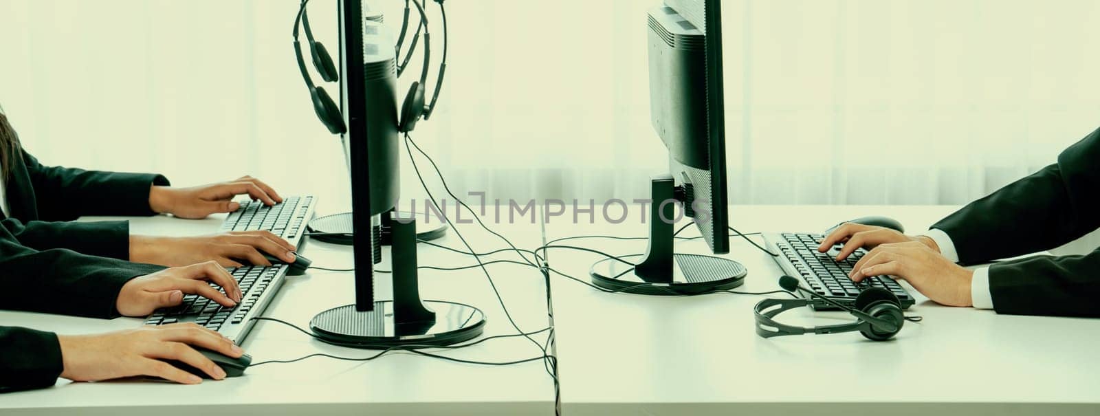 Call center wearing headset working in office for customer support oratory by biancoblue