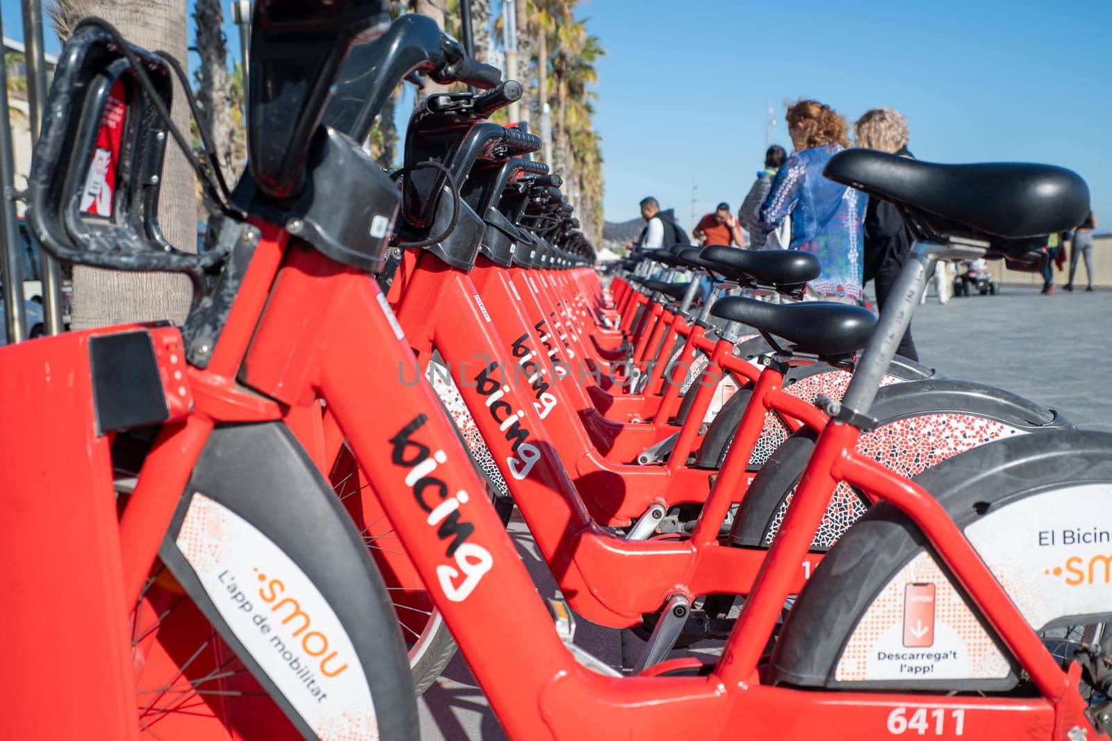 Barcelona, Spain: November 19, 2023: Public Bicycle Service in Barcelona on the beach of La Barceloneta in the capital of Catalonia in Spain in 2023.