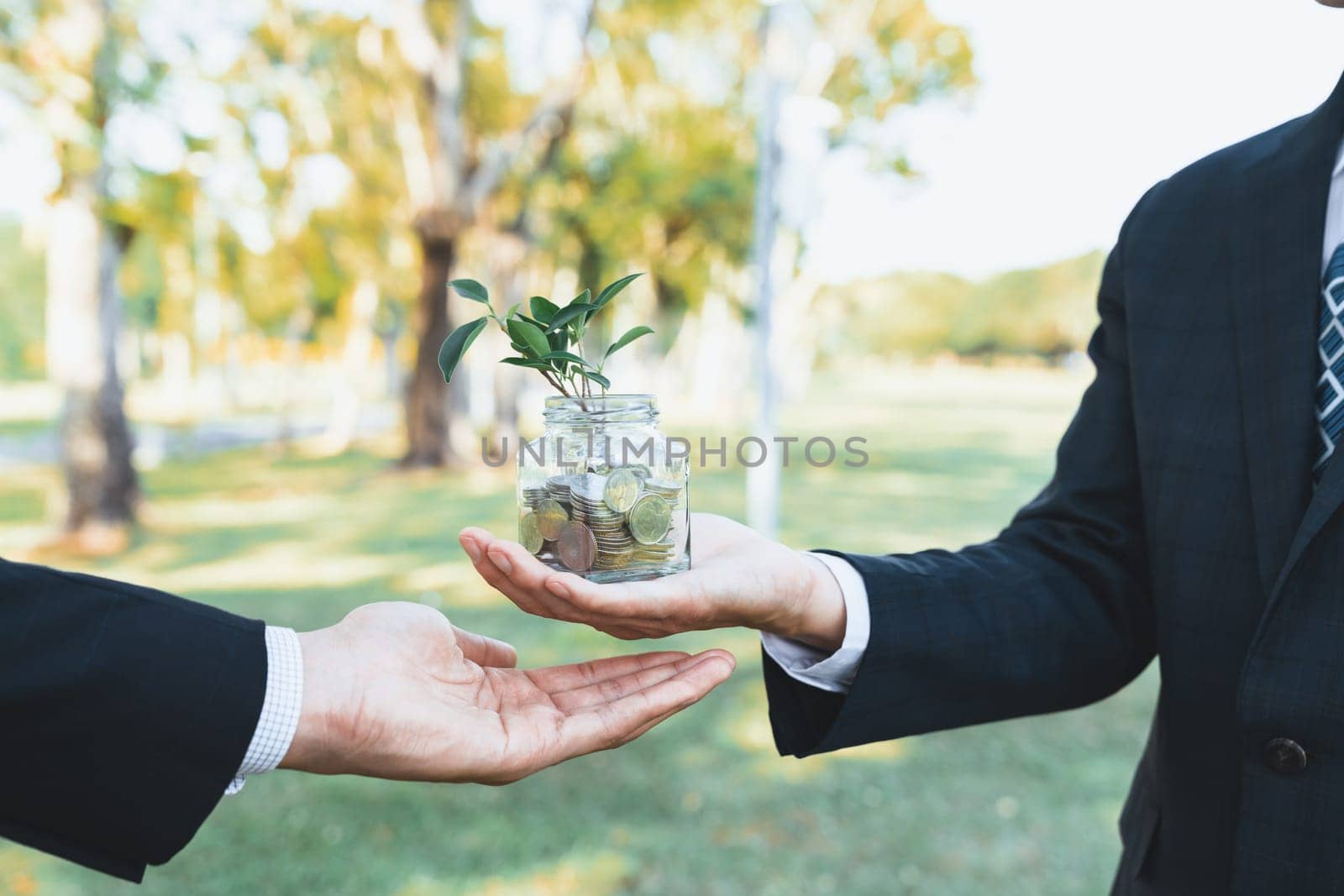 Concept of sustainable money growth investment with glass jar. Gyre by biancoblue