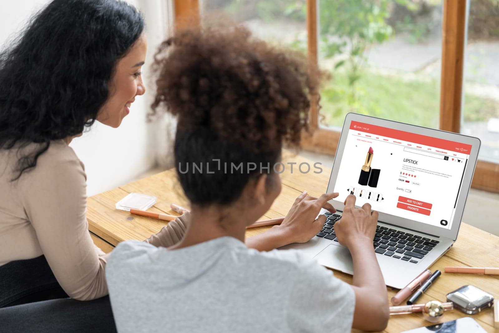 Woman shopping online on internet marketplace browsing for crucial sale items by biancoblue