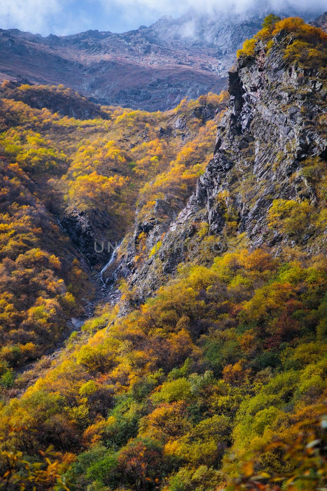 Colorful autumn transforms the mountain world, creating breathtaking landscapes