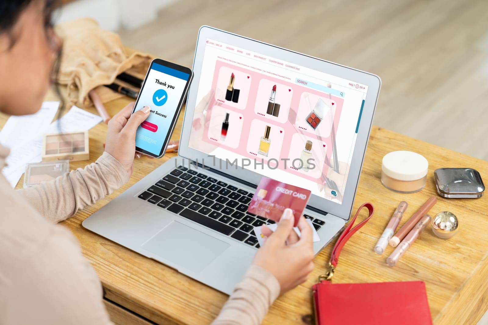 Woman shopping online on internet marketplace browsing for sale items for modern lifestyle and use credit card for online payment from wallet protected by crucial cyber security software